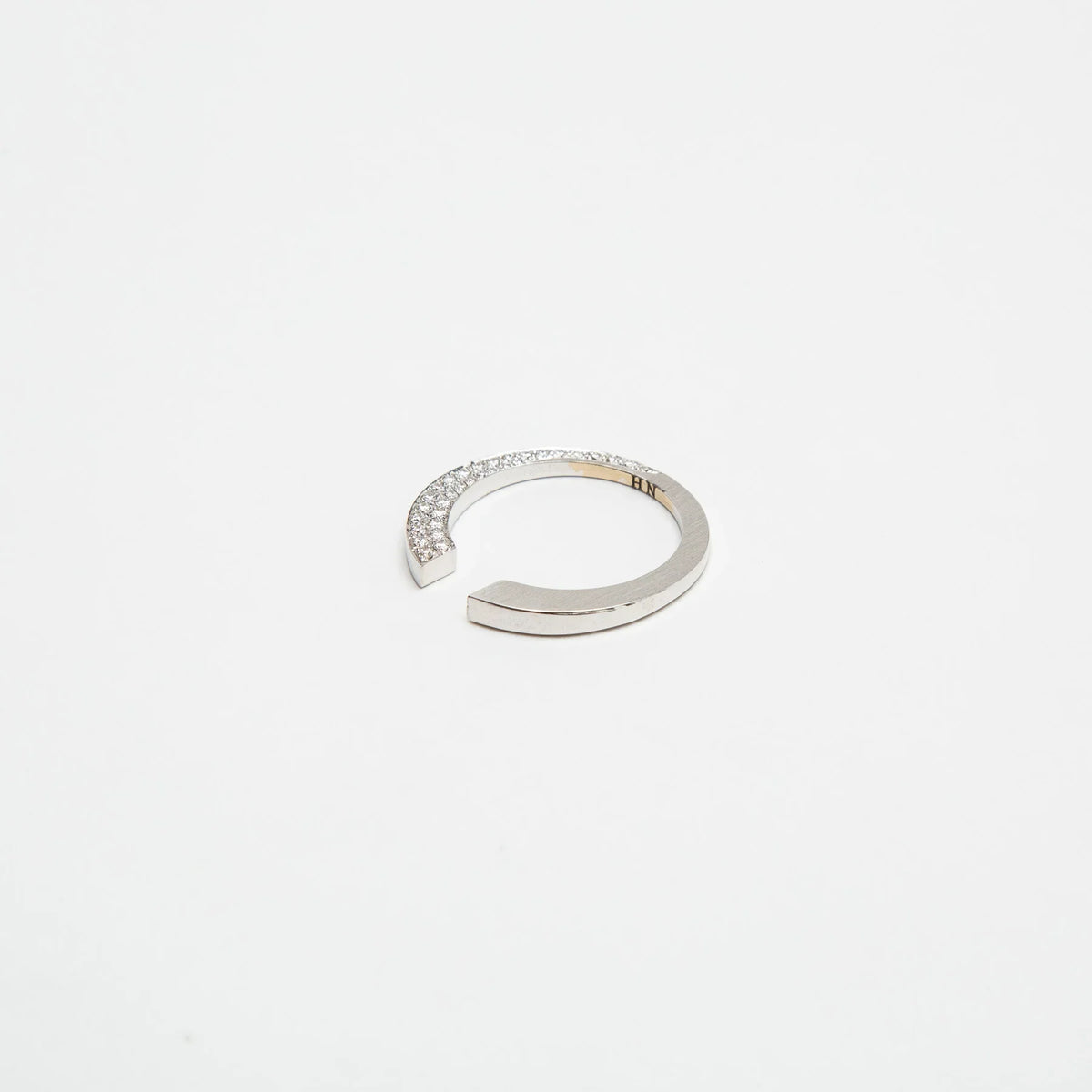 HADAR NORNBERG | HALF DIAMOND TITLED RING