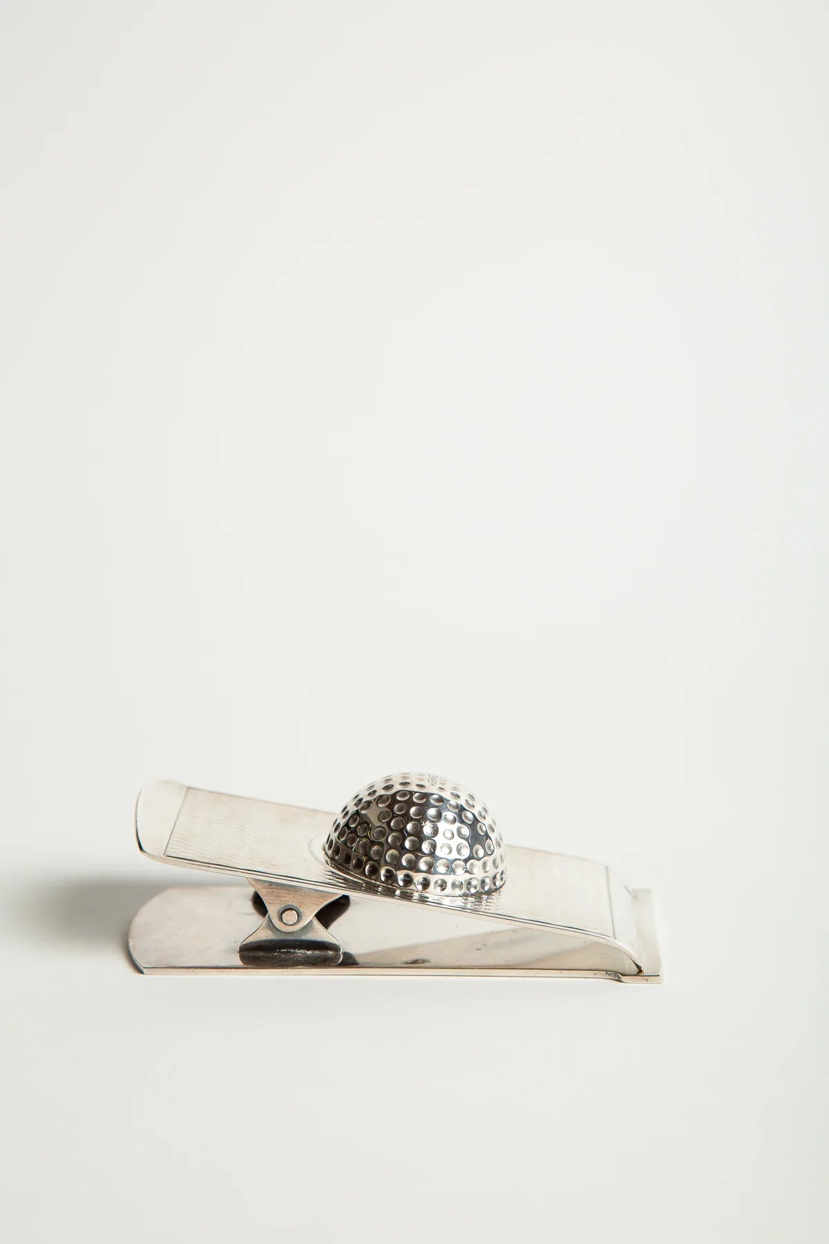 HERMÈS | 1960'S SILVER GOLF BALL PAPER CLIP