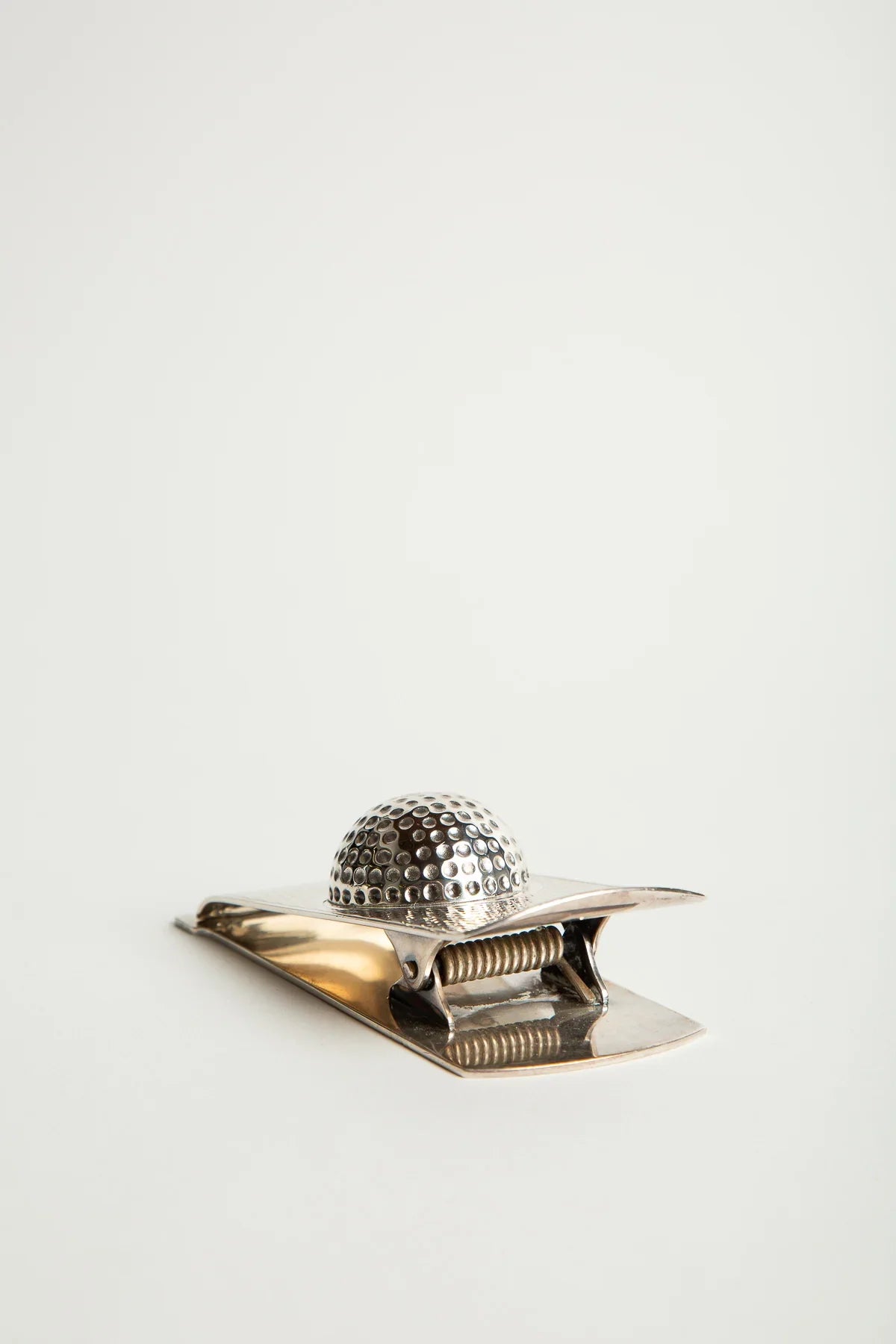 HERMÈS | 1960'S SILVER GOLF BALL PAPER CLIP