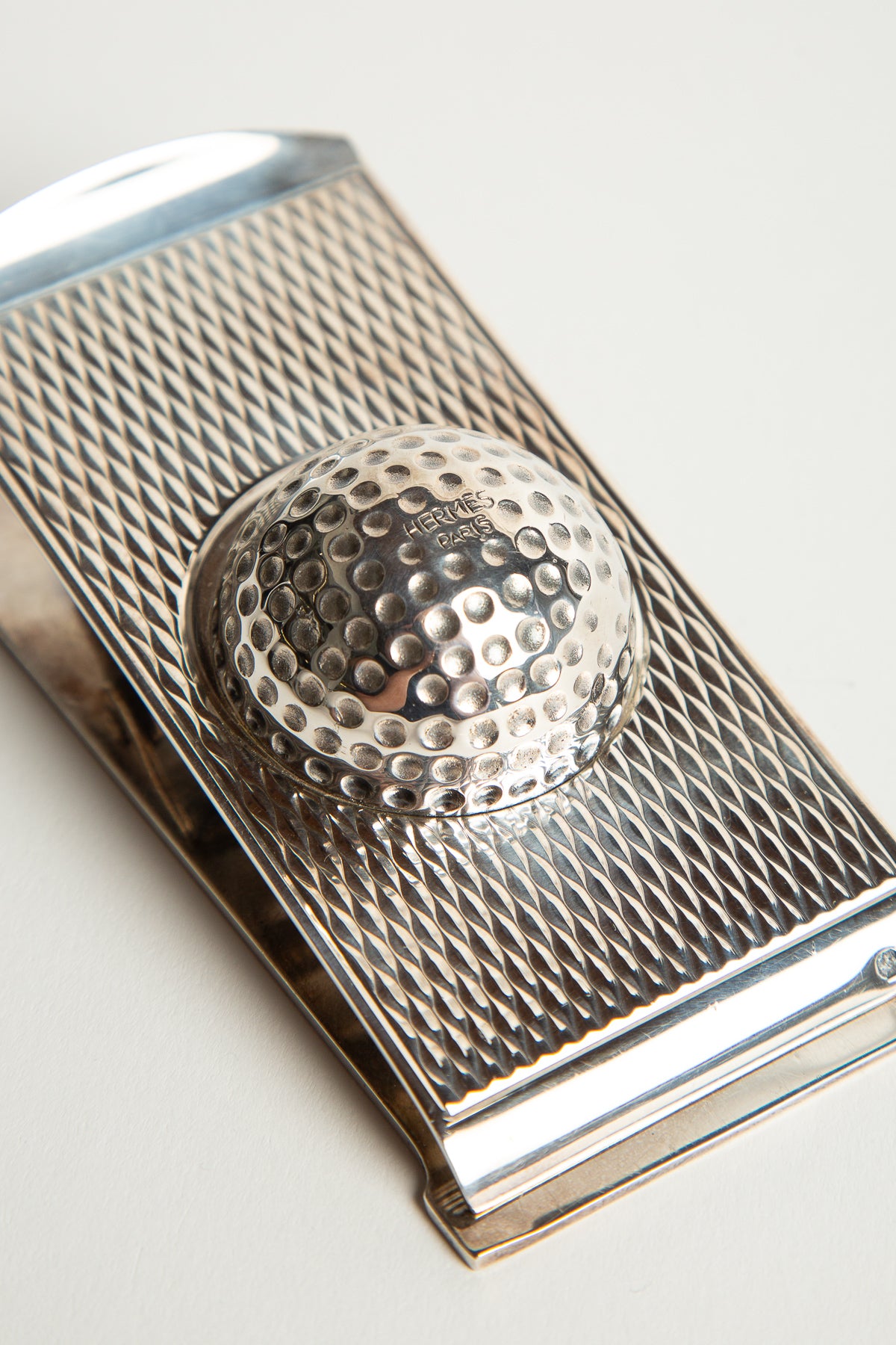 HERMÈS | 1960'S SILVER GOLF BALL PAPER CLIP