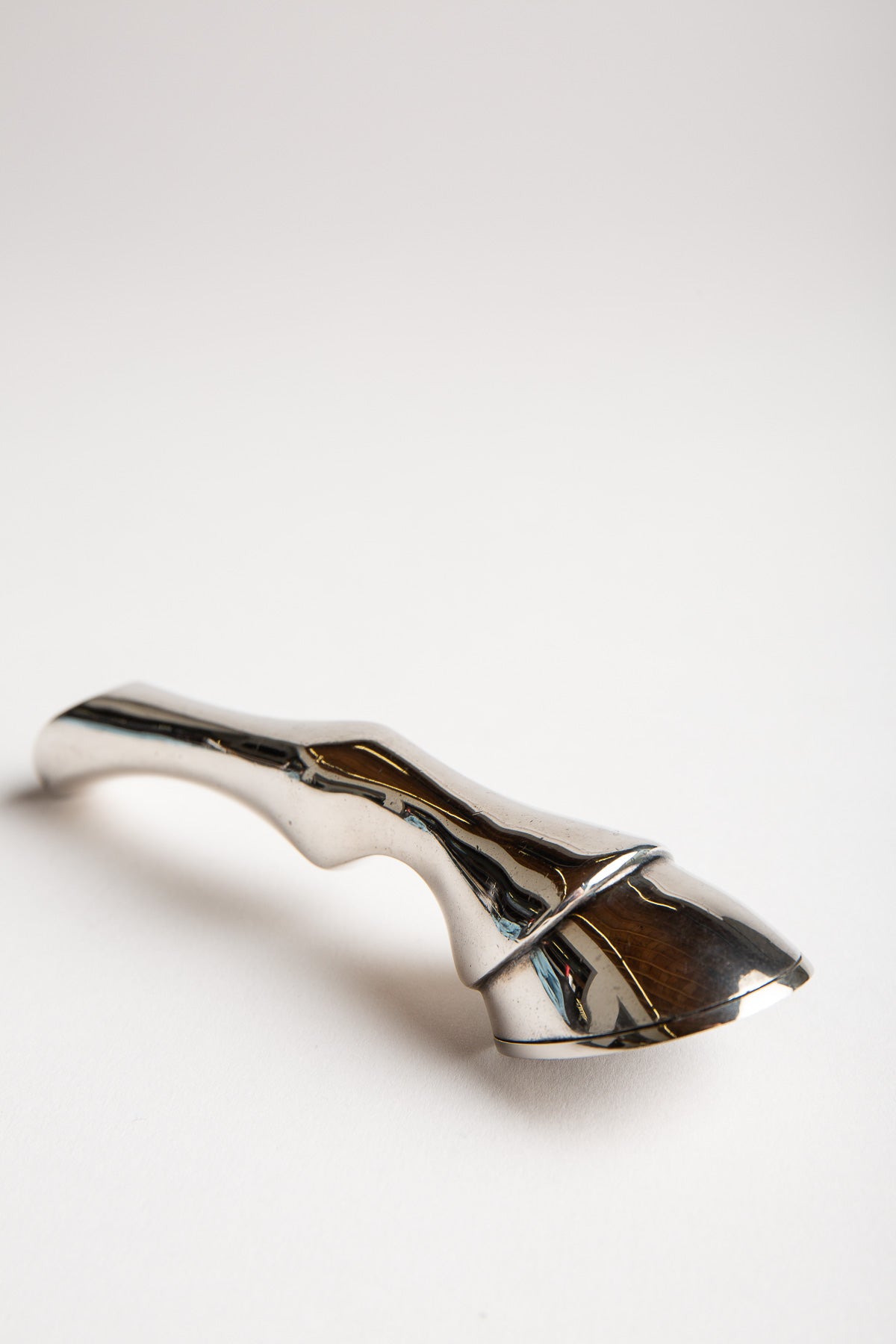 HERMÈS | 1970'S SILVER-PLATED HOOF BOTTLE OPENER