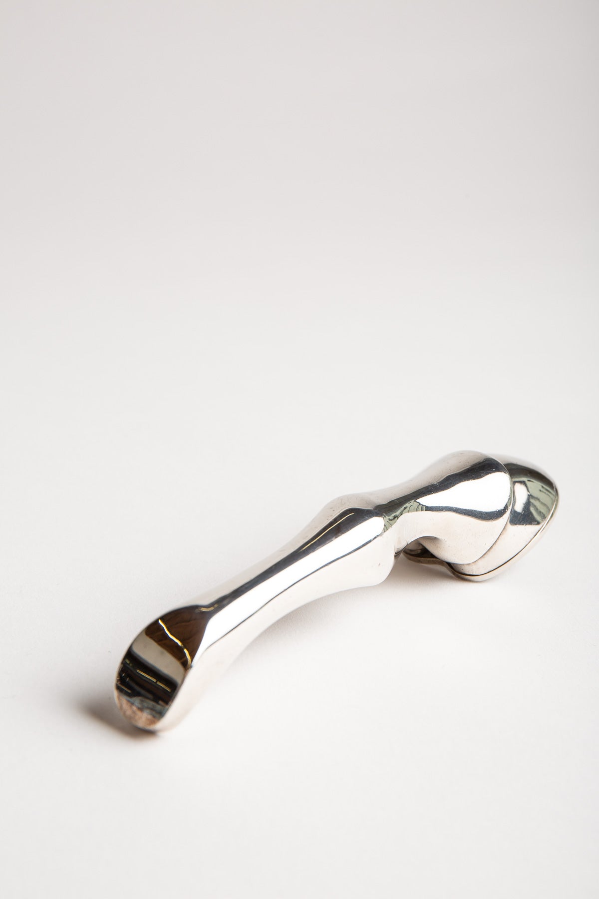 HERMÈS | 1970'S SILVER-PLATED HOOF BOTTLE OPENER
