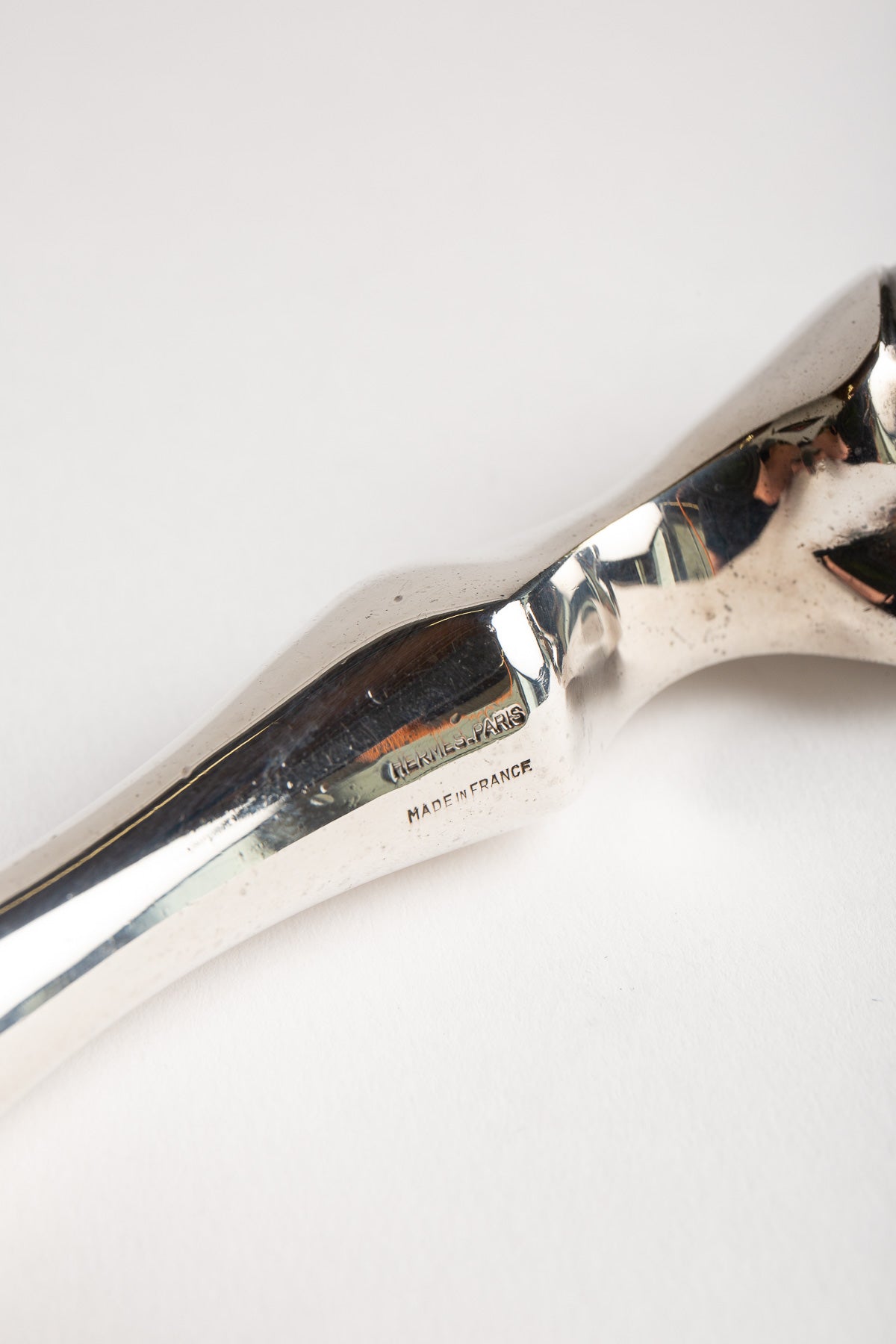 HERMÈS | 1970'S SILVER-PLATED HOOF BOTTLE OPENER
