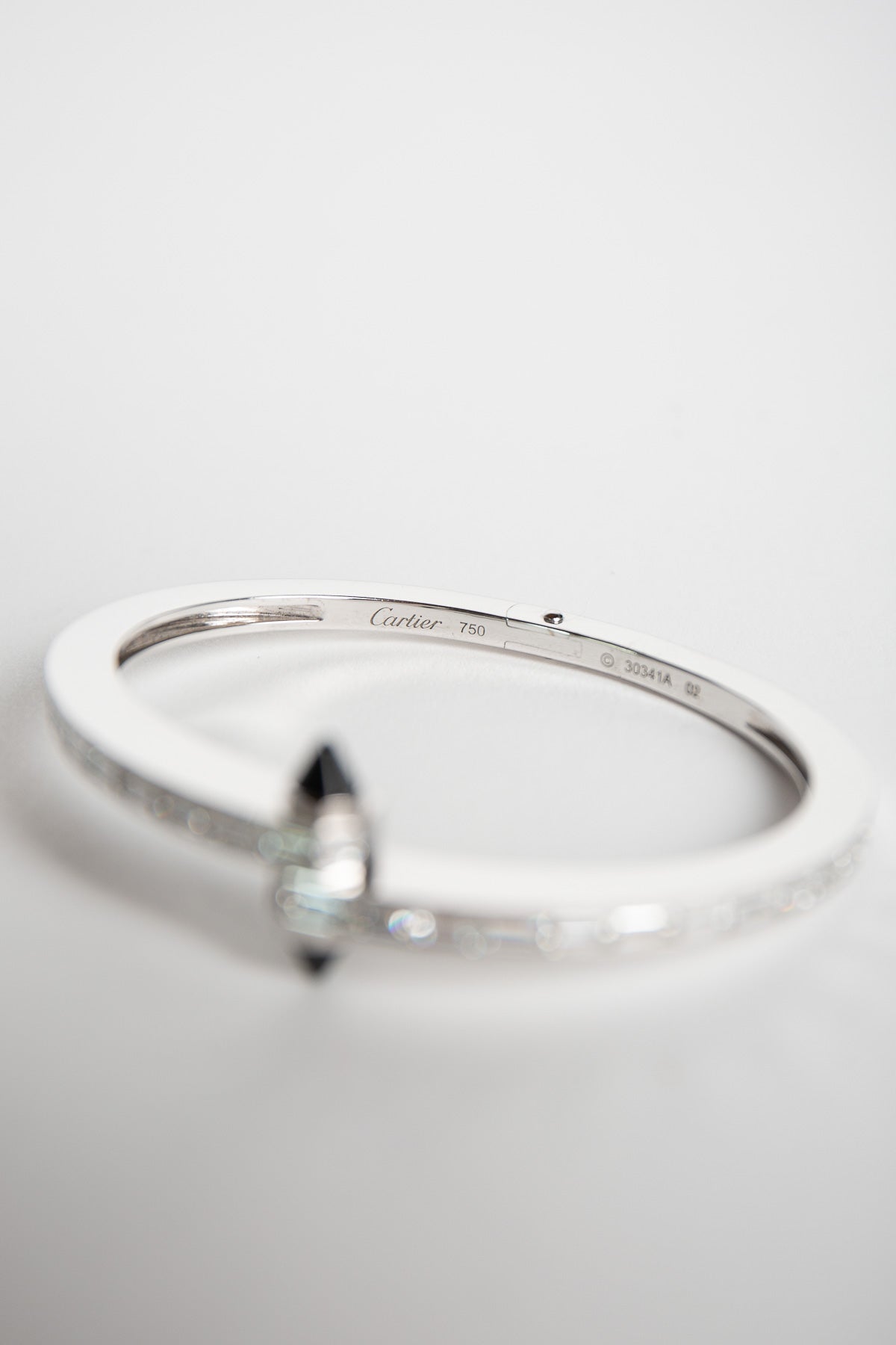 CARTIER | 1990'S WHITE GOLD, DIAMOND, ONYX BRACLET