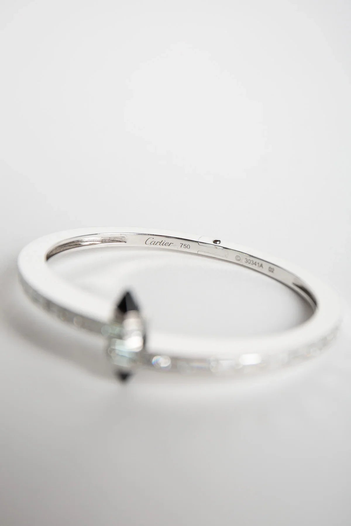 CARTIER | 1990'S WHITE GOLD, DIAMOND, ONYX BRACLET