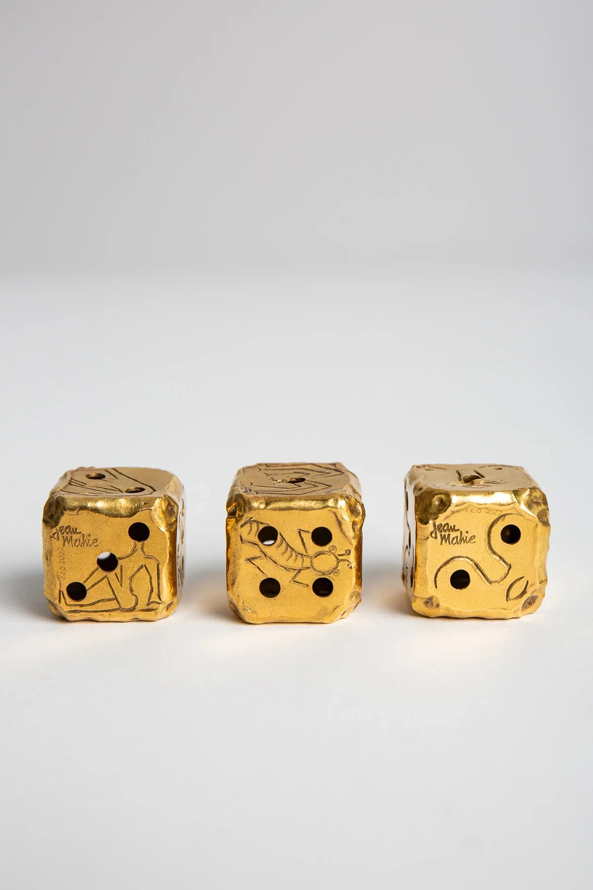 CARTIER | VINTAGE GOLD JEAN MAHIE DICE, SET OF 3