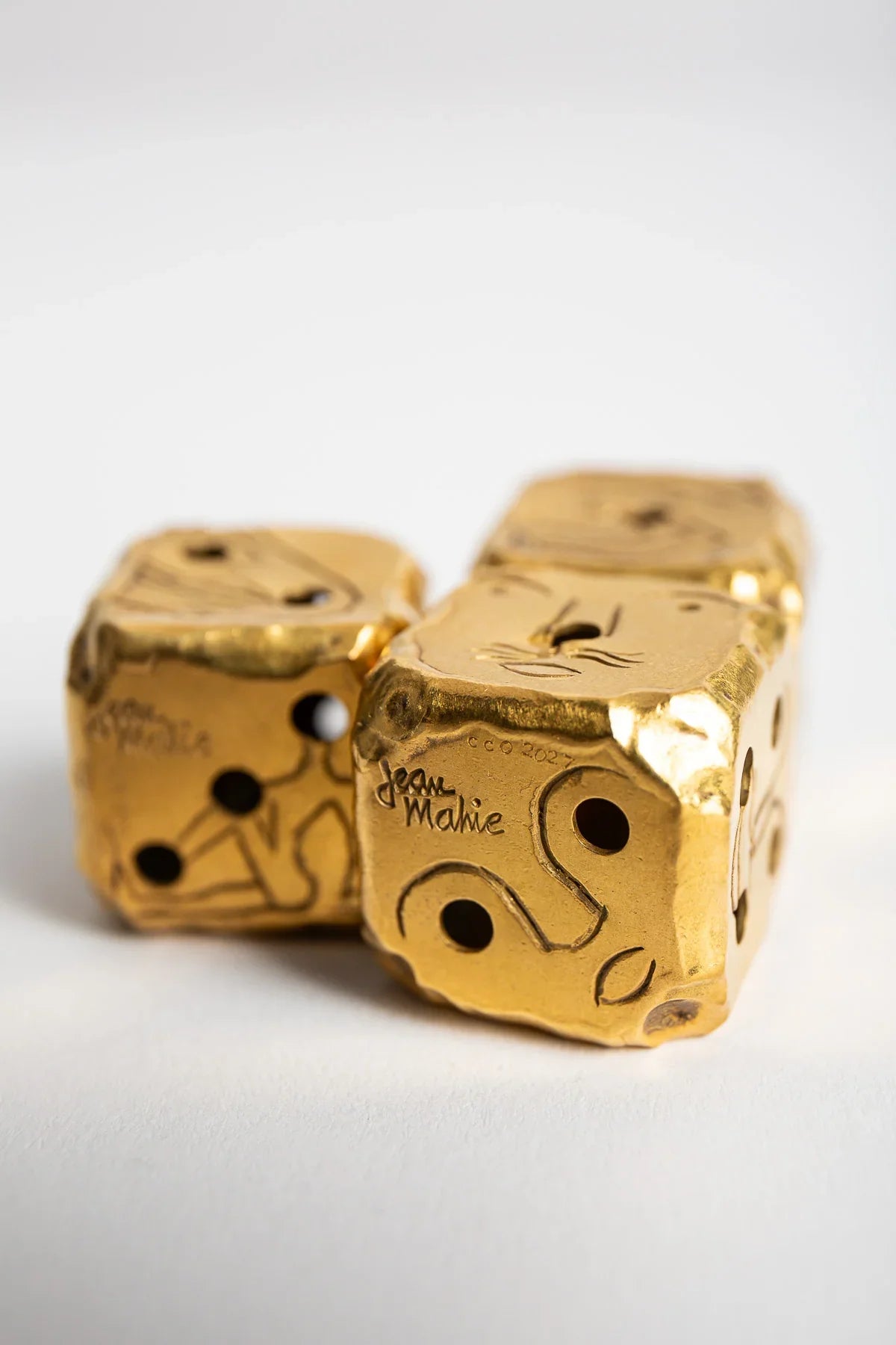 CARTIER | VINTAGE GOLD JEAN MAHIE DICE, SET OF 3