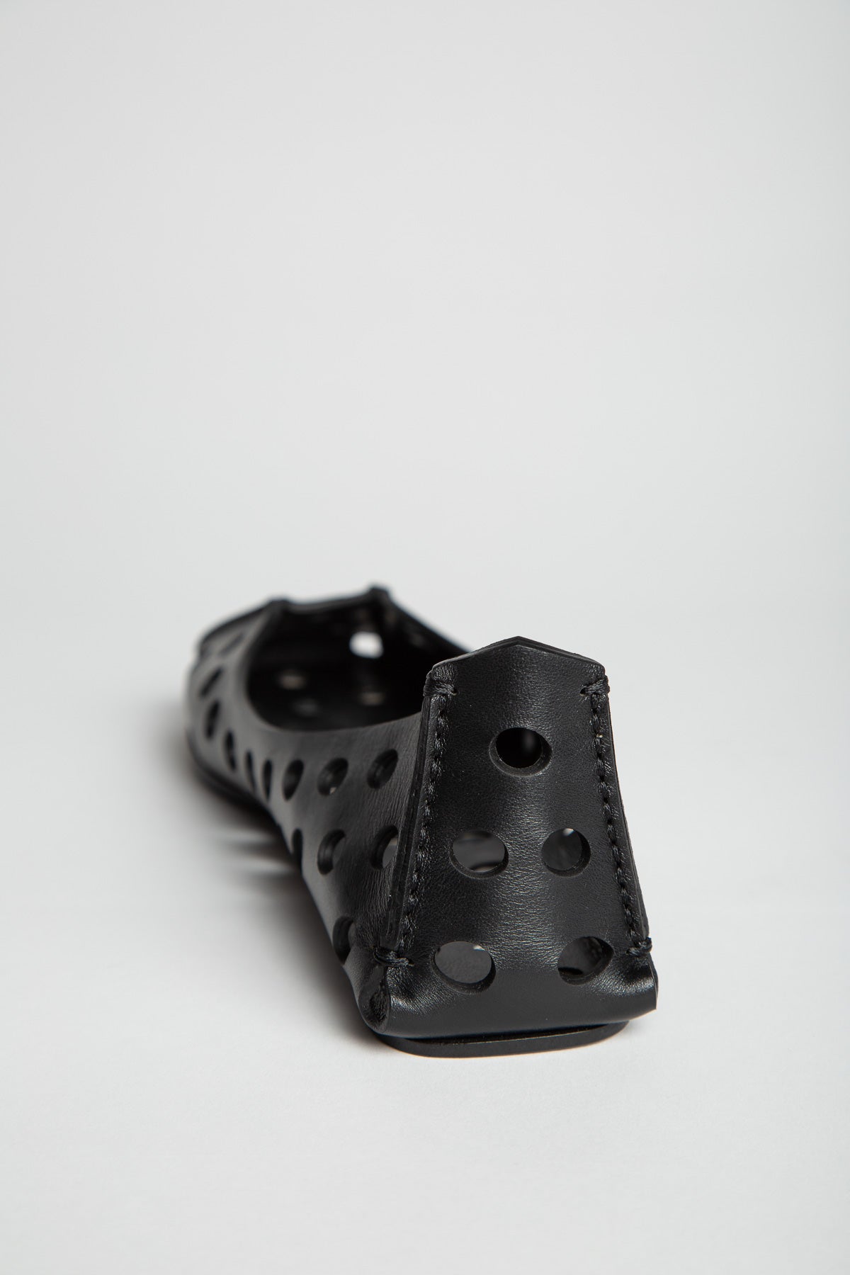 ALAÏA | PERFO BALLET FLATS IN CALFSKIN