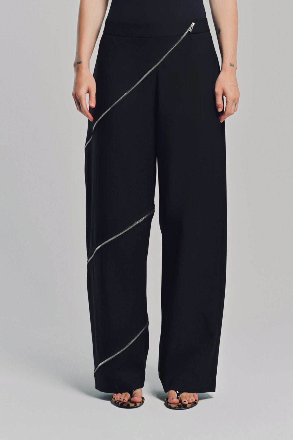 ALAÏA | ZIP-UP SPIRAL PANTS