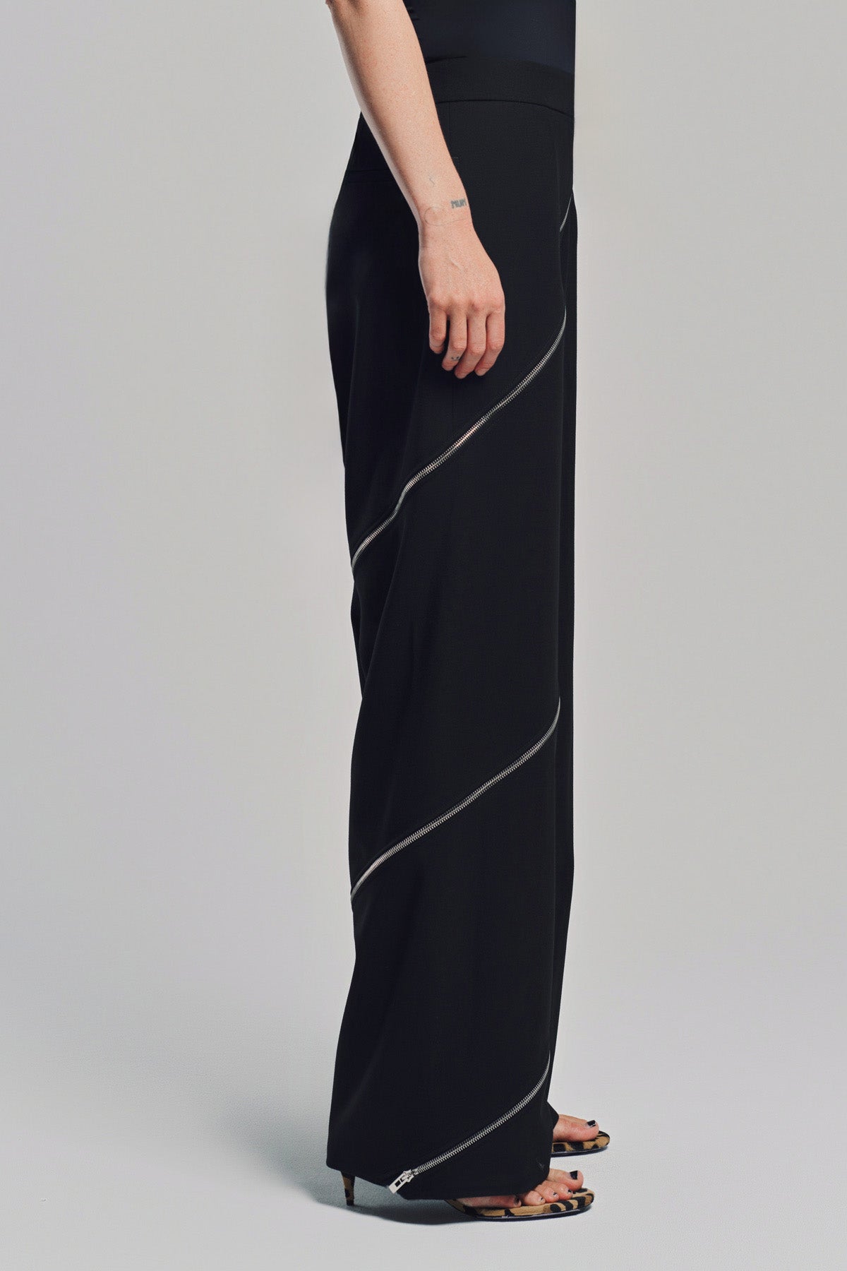 ALAÏA | ZIP-UP SPIRAL PANTS