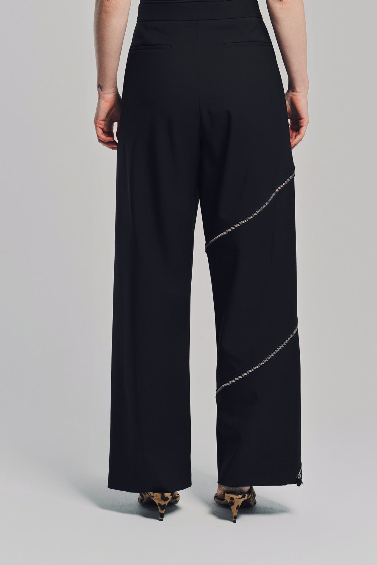 ALAÏA | ZIP-UP SPIRAL PANTS