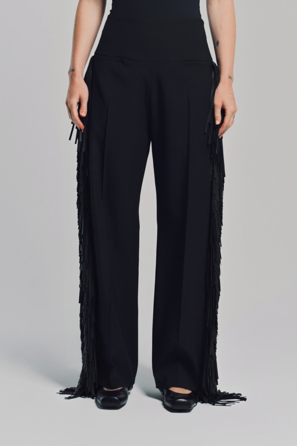 ALAÏA | FRINGED WOOL GABARDINE PANTS