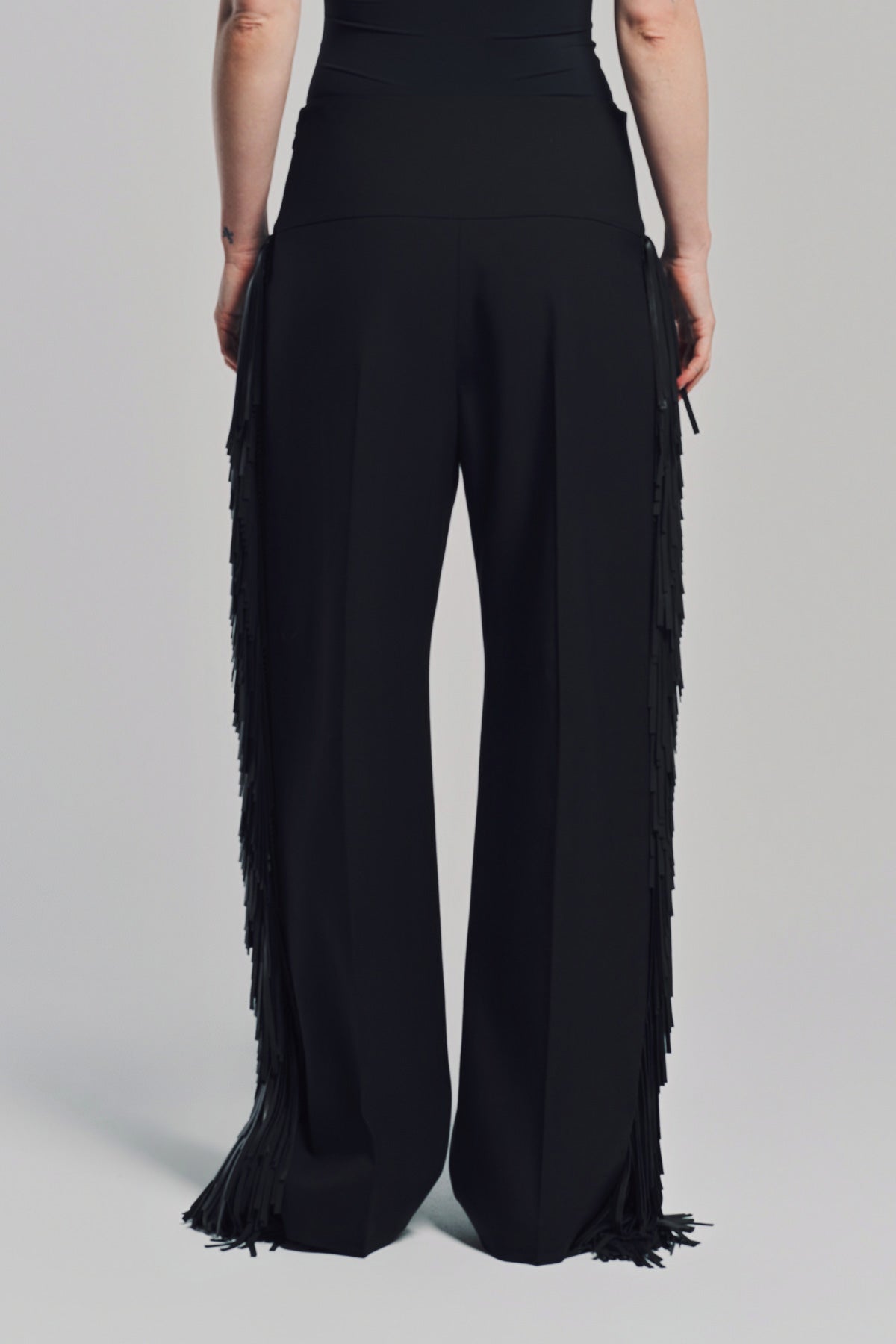 ALAÏA | FRINGED WOOL GABARDINE PANTS