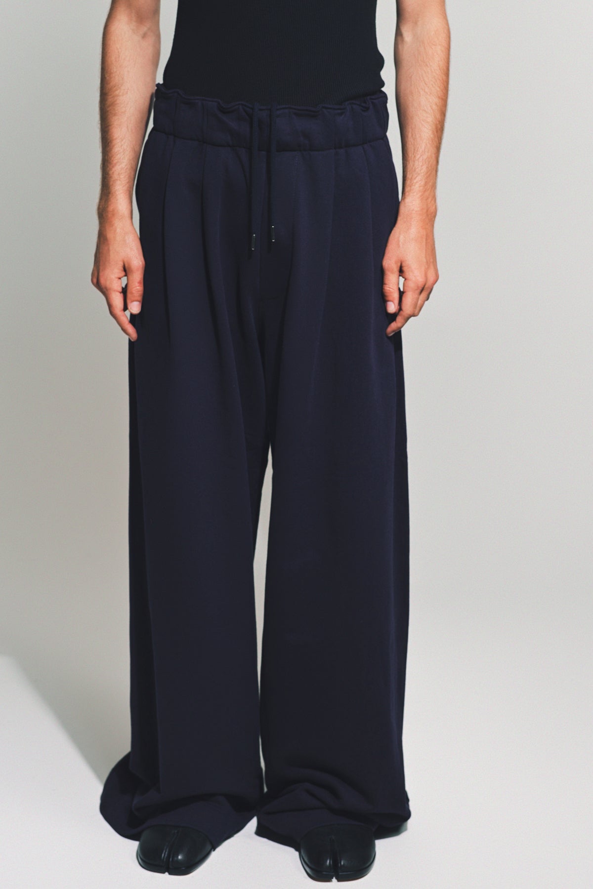 DRIES VAN NOTEN | PLEATED SWEATPANTS