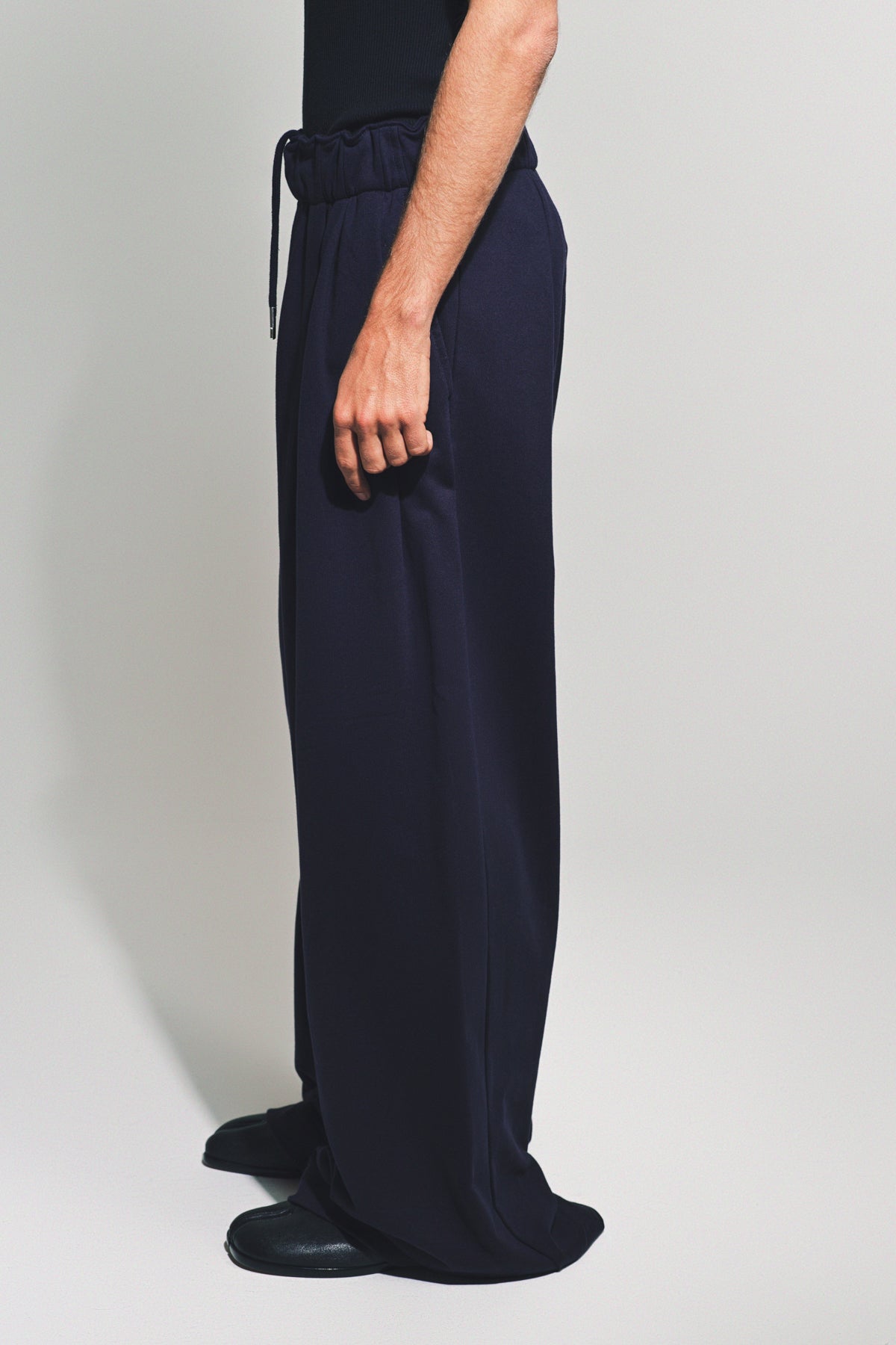 DRIES VAN NOTEN | PLEATED SWEATPANTS