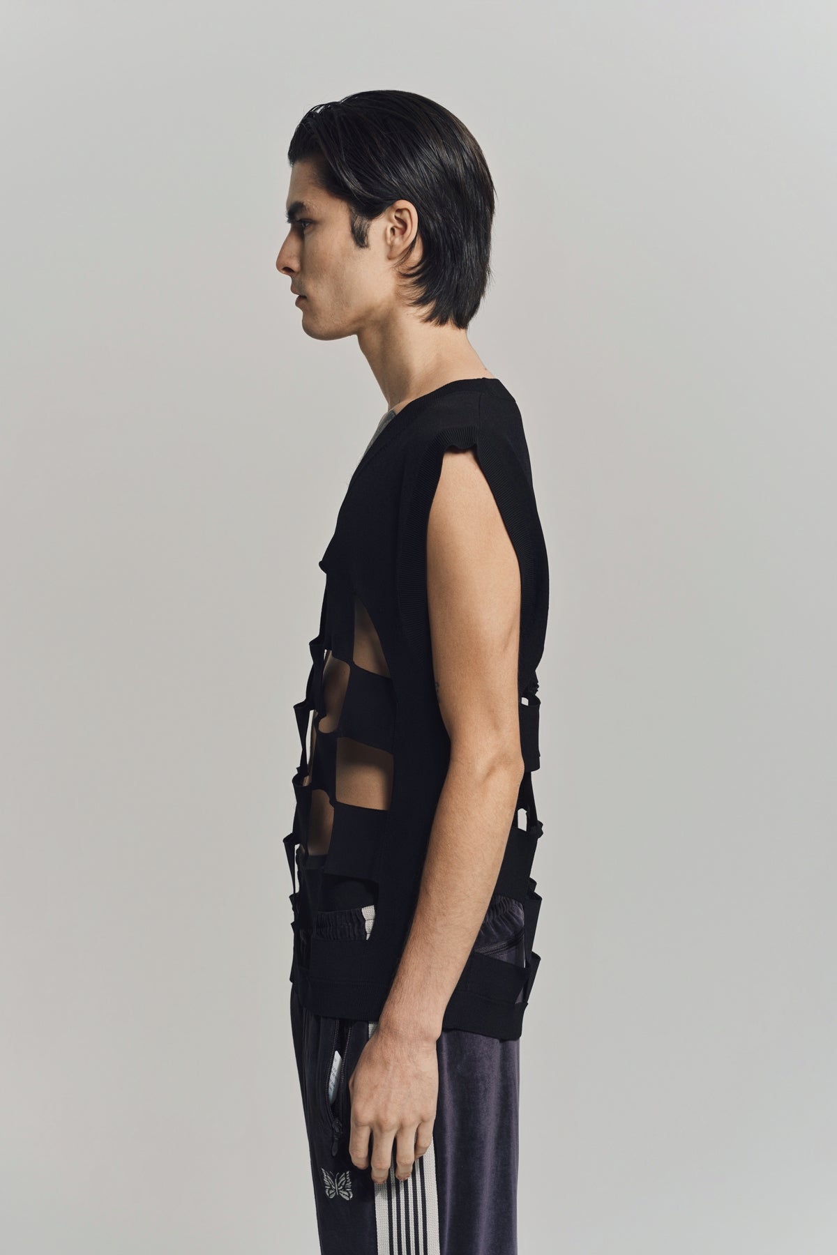 NOMARHYTHM TEXTILE | CUT-OUT CHECKER KNIT VEST