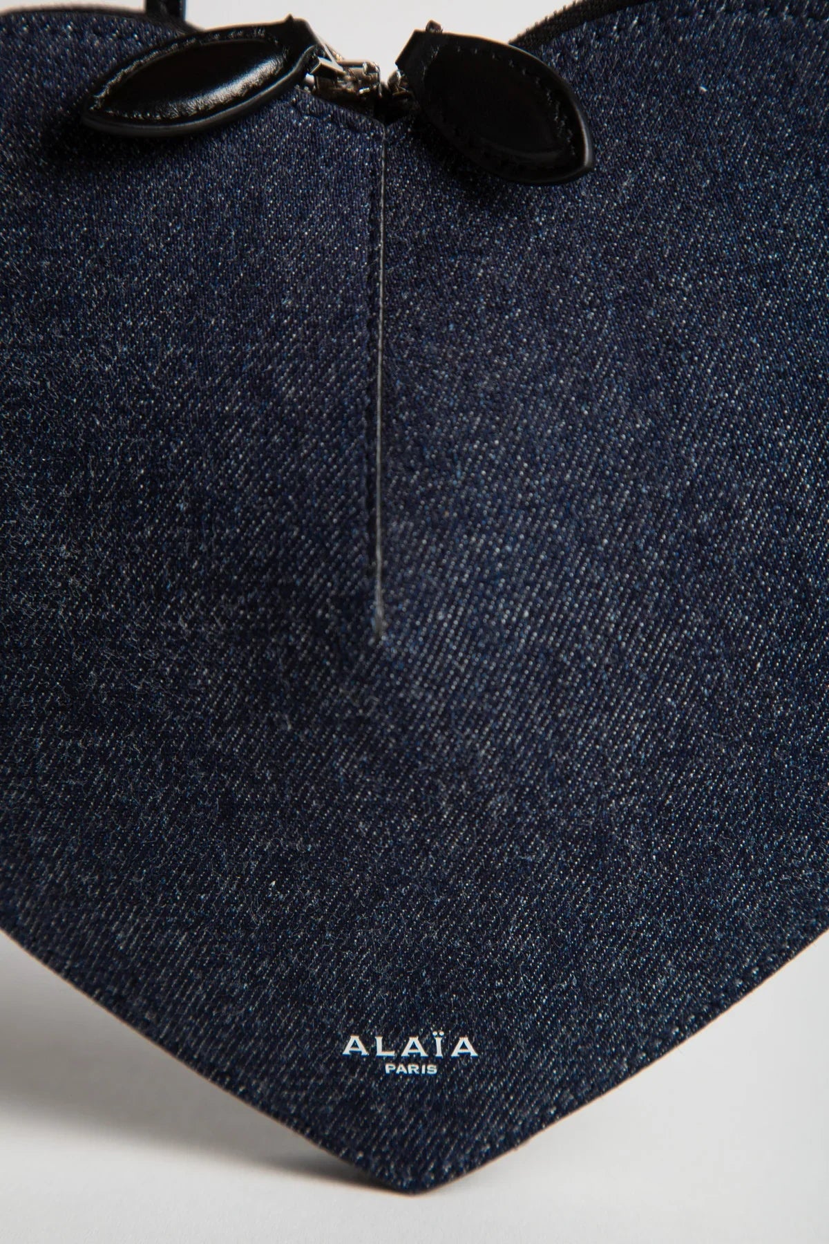 ALAÏA | LE COEUR IN DENIM AND LEATHER