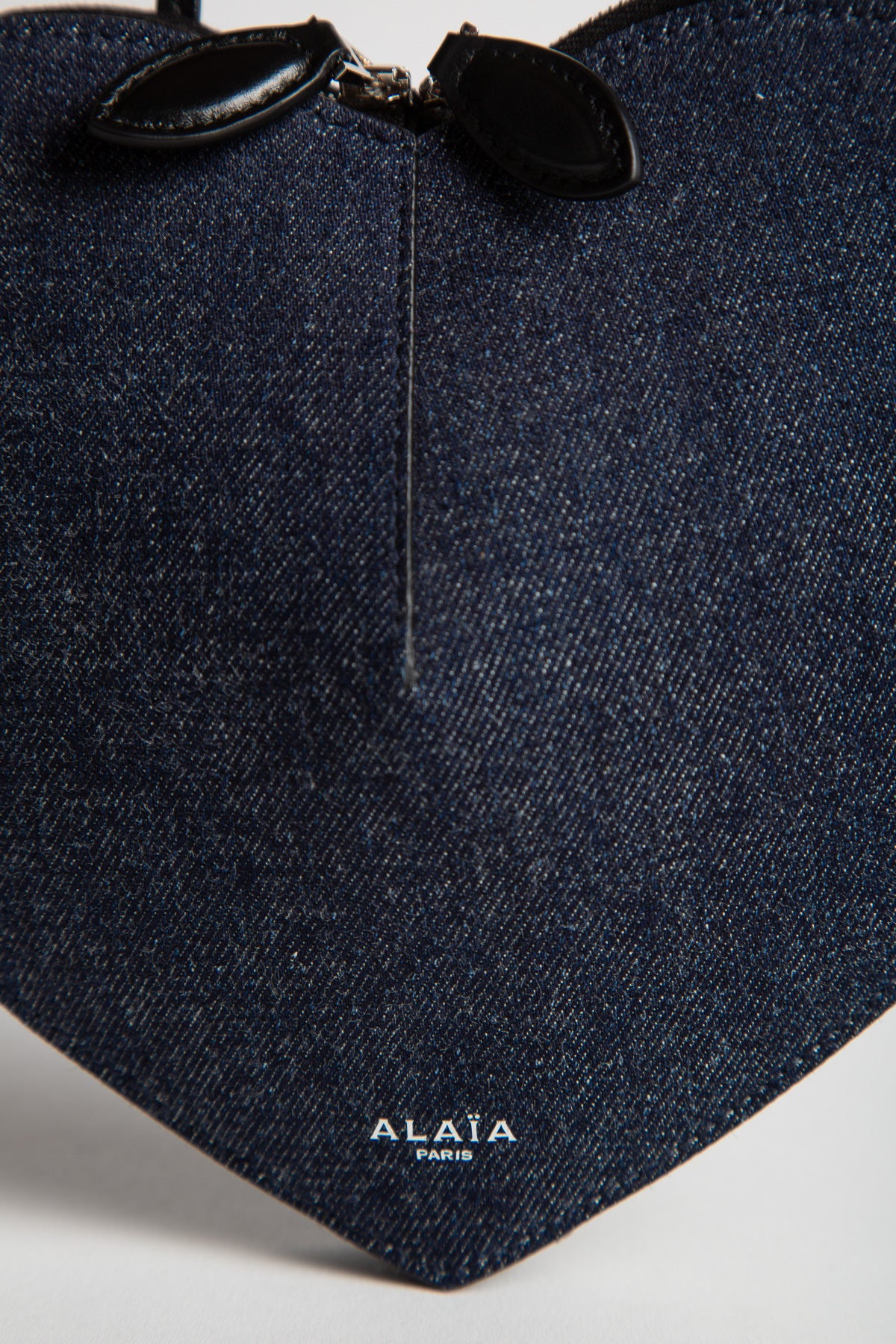 ALAÏA | LE COEUR IN DENIM AND LEATHER