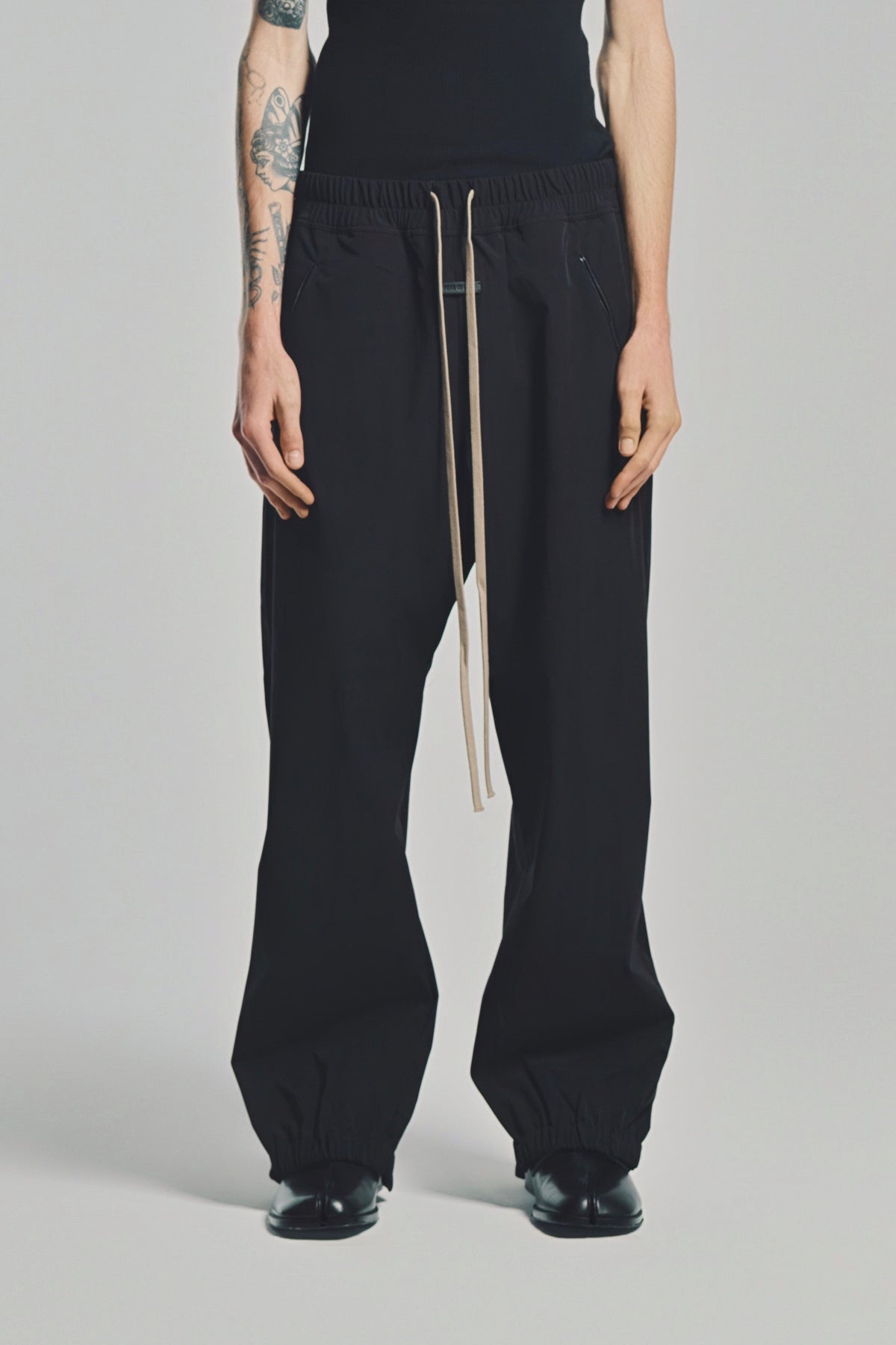FEAR OF GOD | NYLON TRACKPANTS