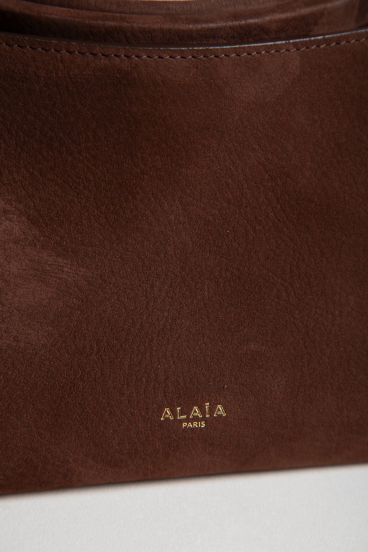 ALAÏA | LE CLICK SMALL SQUARE BAG IN NUBUCK