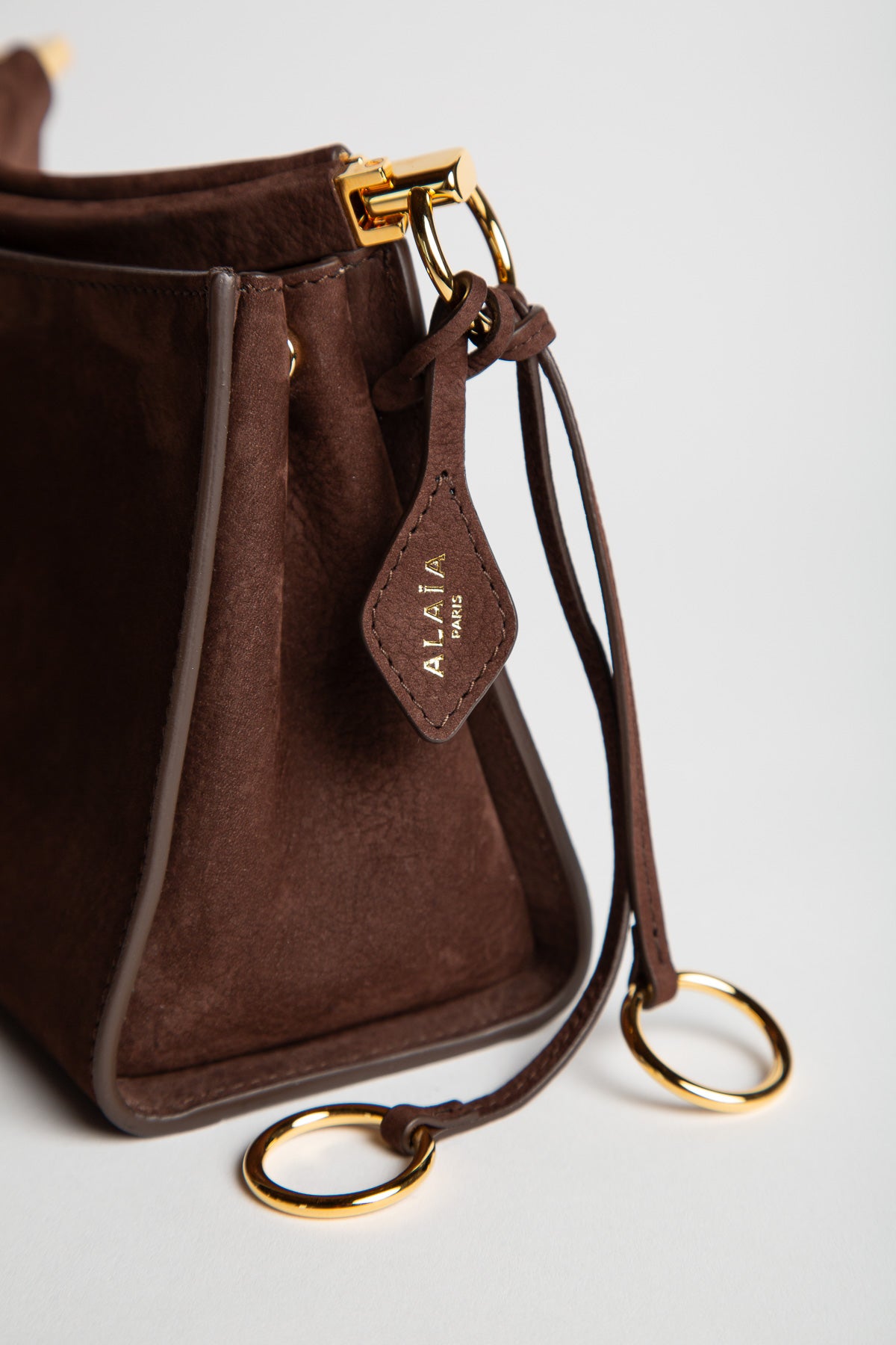ALAÏA | LE CLICK SMALL SQUARE BAG IN NUBUCK