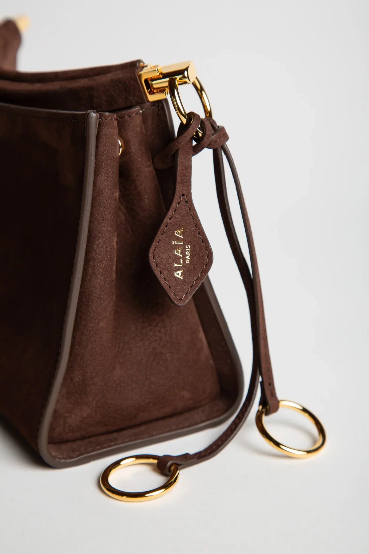 ALAÏA | LE CLICK SMALL SQUARE BAG IN NUBUCK