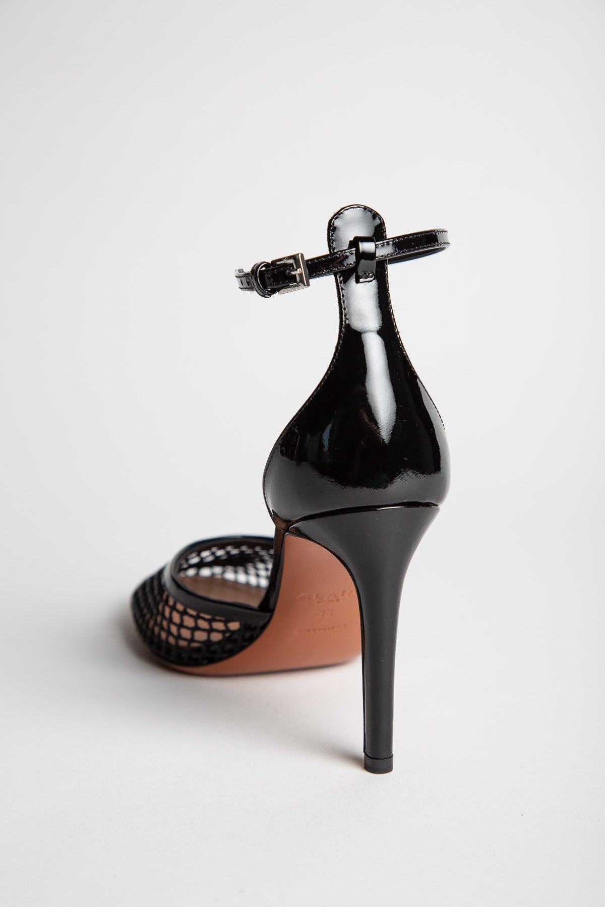 ALAÏA | HIGH FISHNET PUMPS