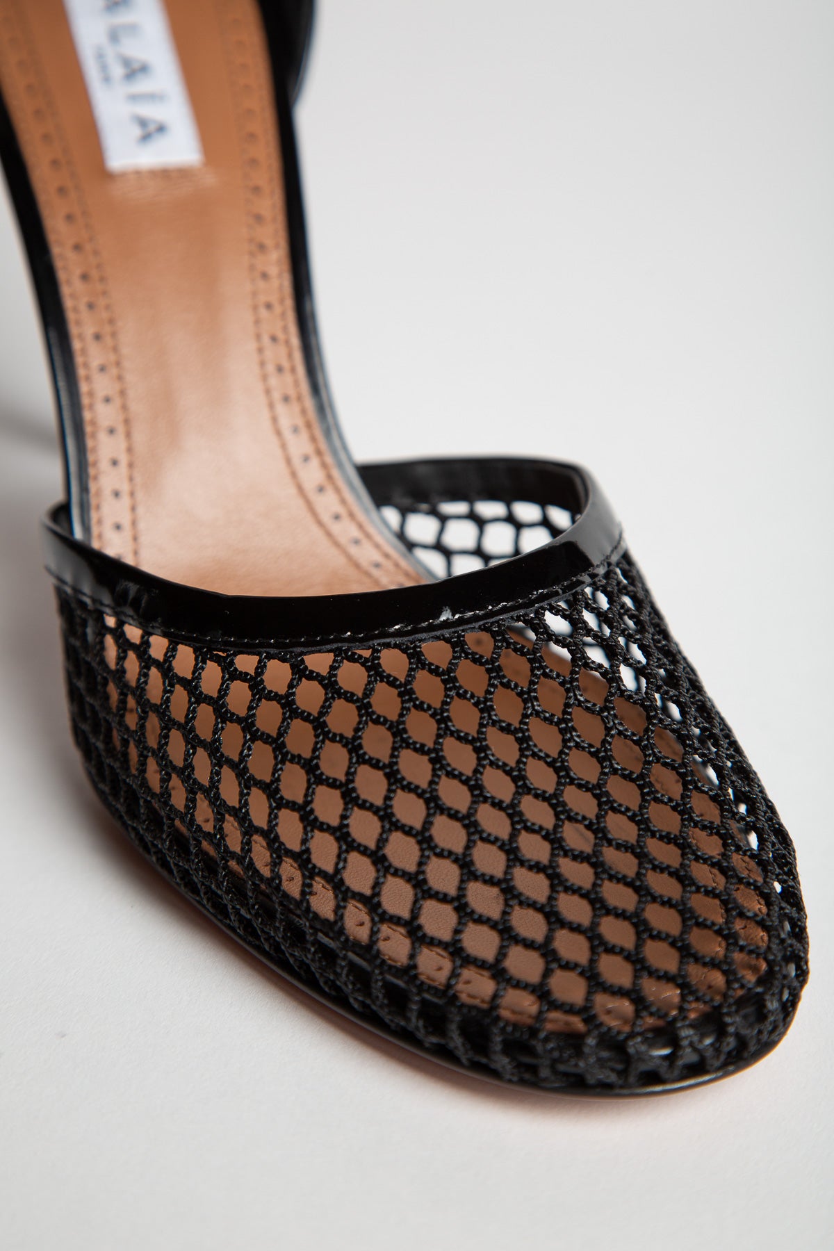 ALAÏA | HIGH FISHNET PUMPS