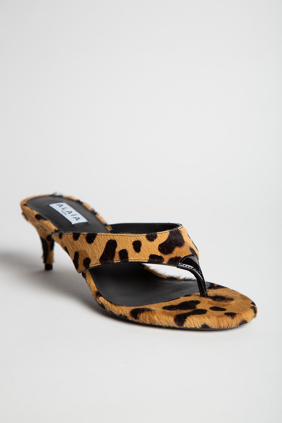 ALAÏA | LEOPARD INFRADITO THONG MULES