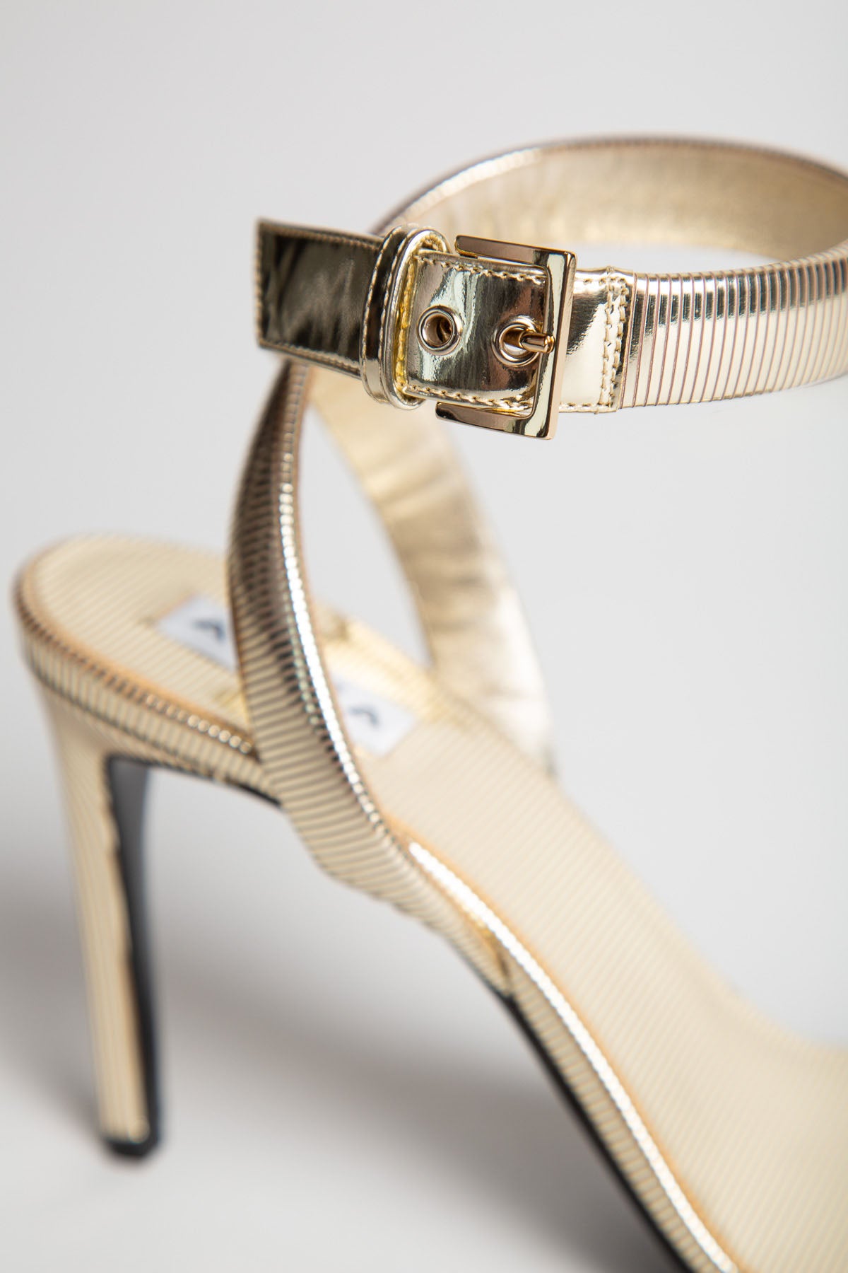 ALAÏA | GOLD LEATHER SANDALS