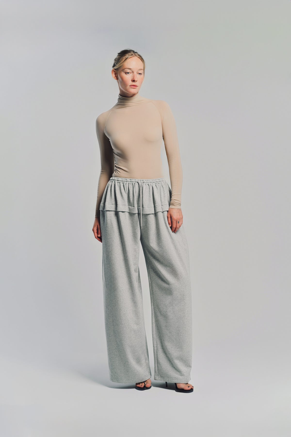 AYA213 ALAÏA | PEPLUM PANT IN COTTON JERSEY