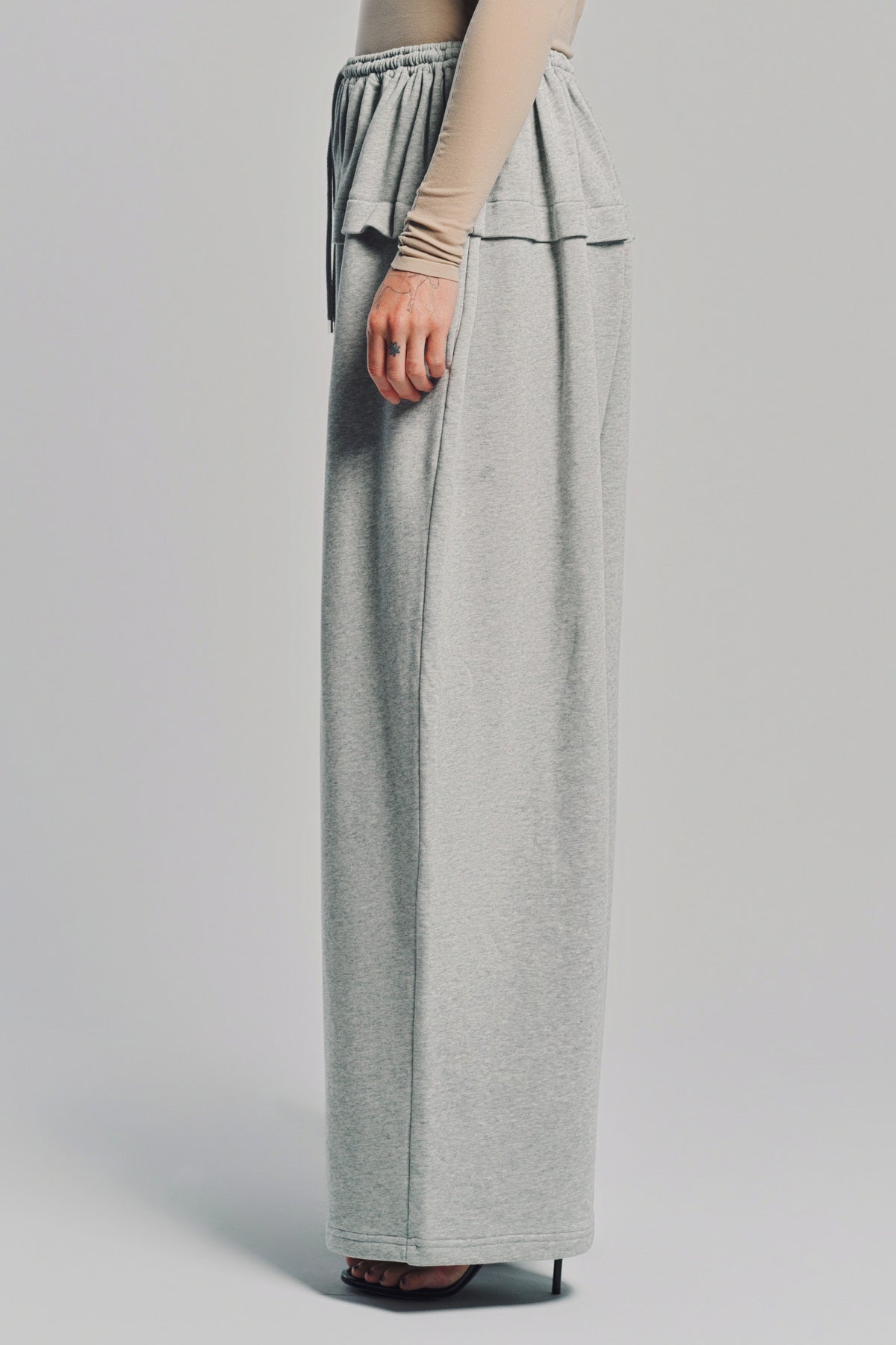 ALAÏA | PEPLUM PANT IN COTTON JERSEY