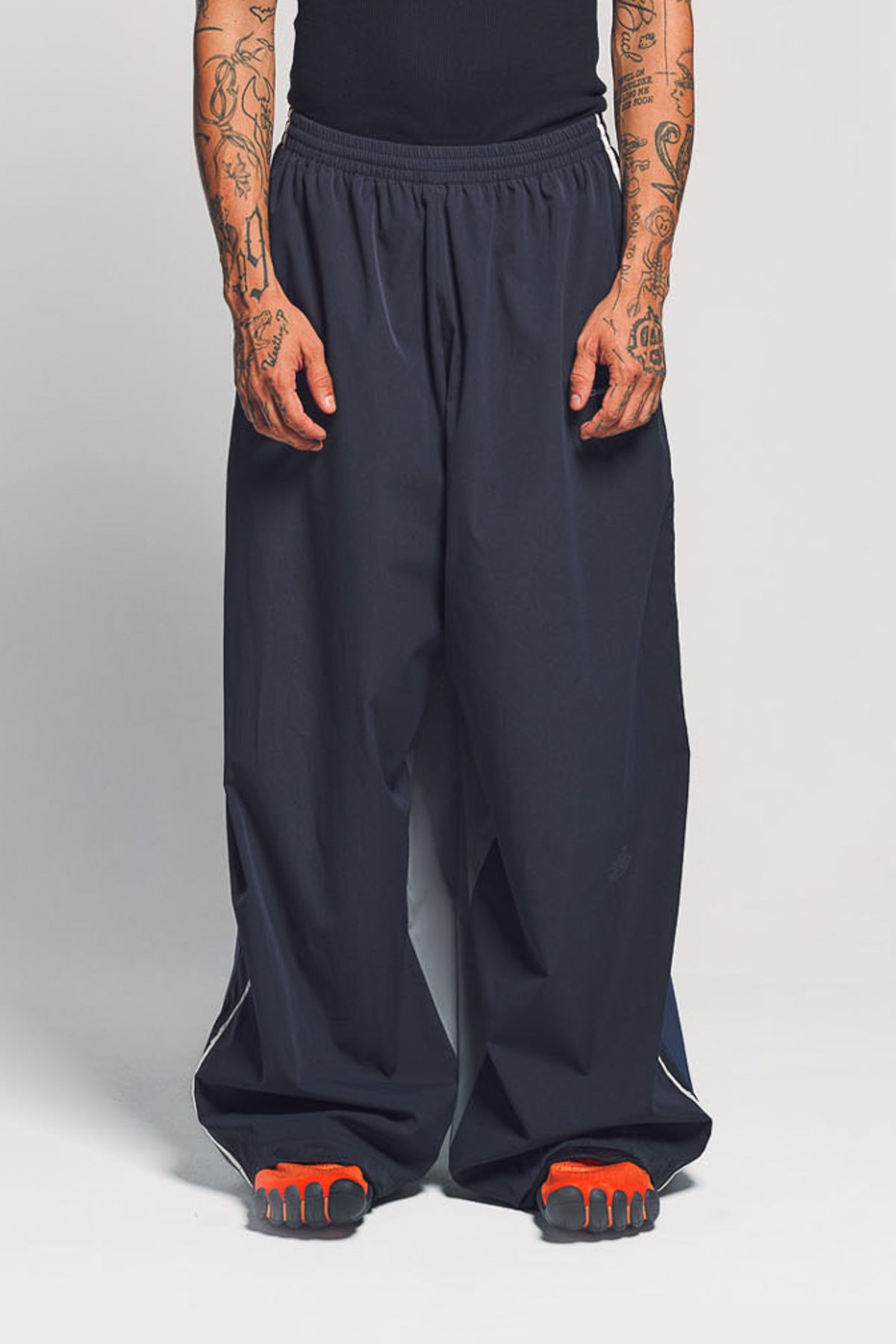 BALENCIAGA | 50/50 TRACKSUIT PANTS