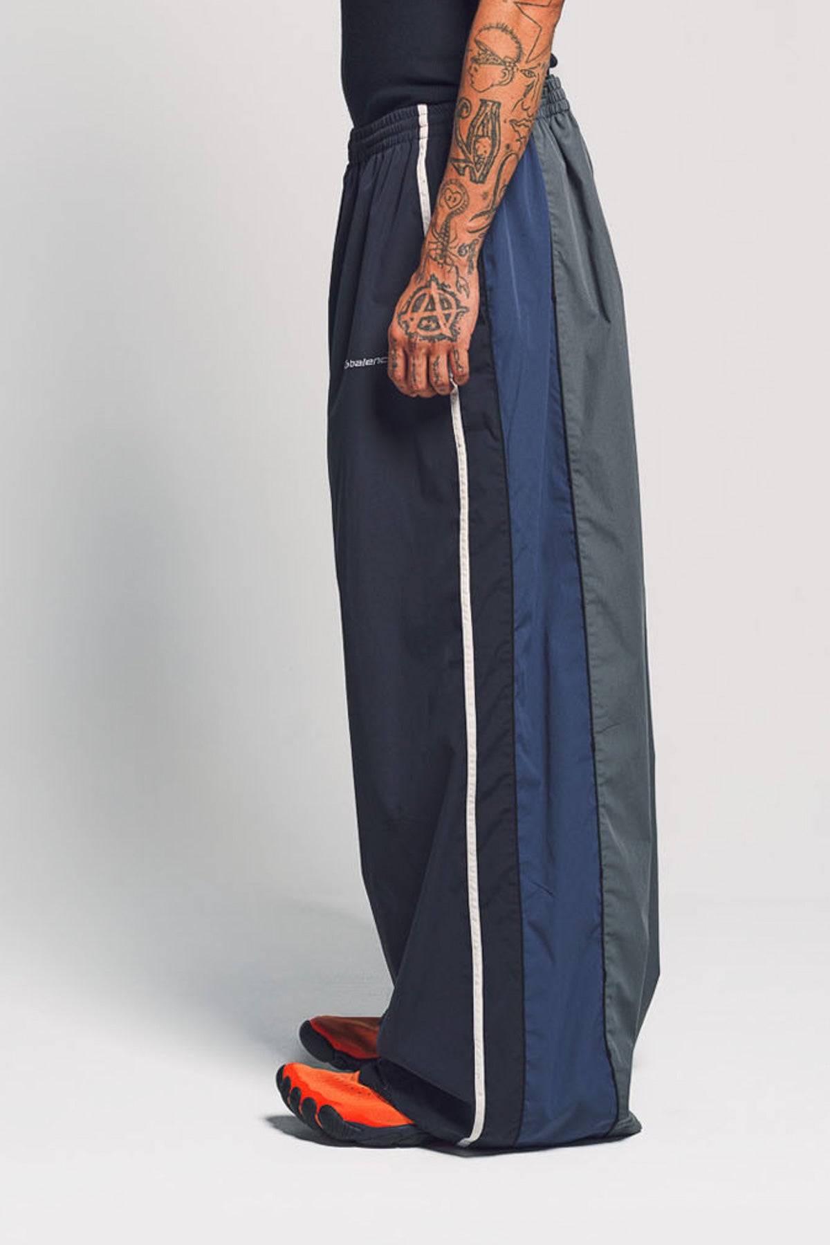 BALENCIAGA | 50/50 TRACKSUIT PANTS