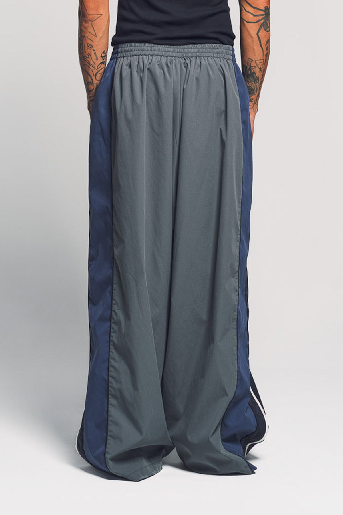 BALENCIAGA | 50/50 TRACKSUIT PANTS