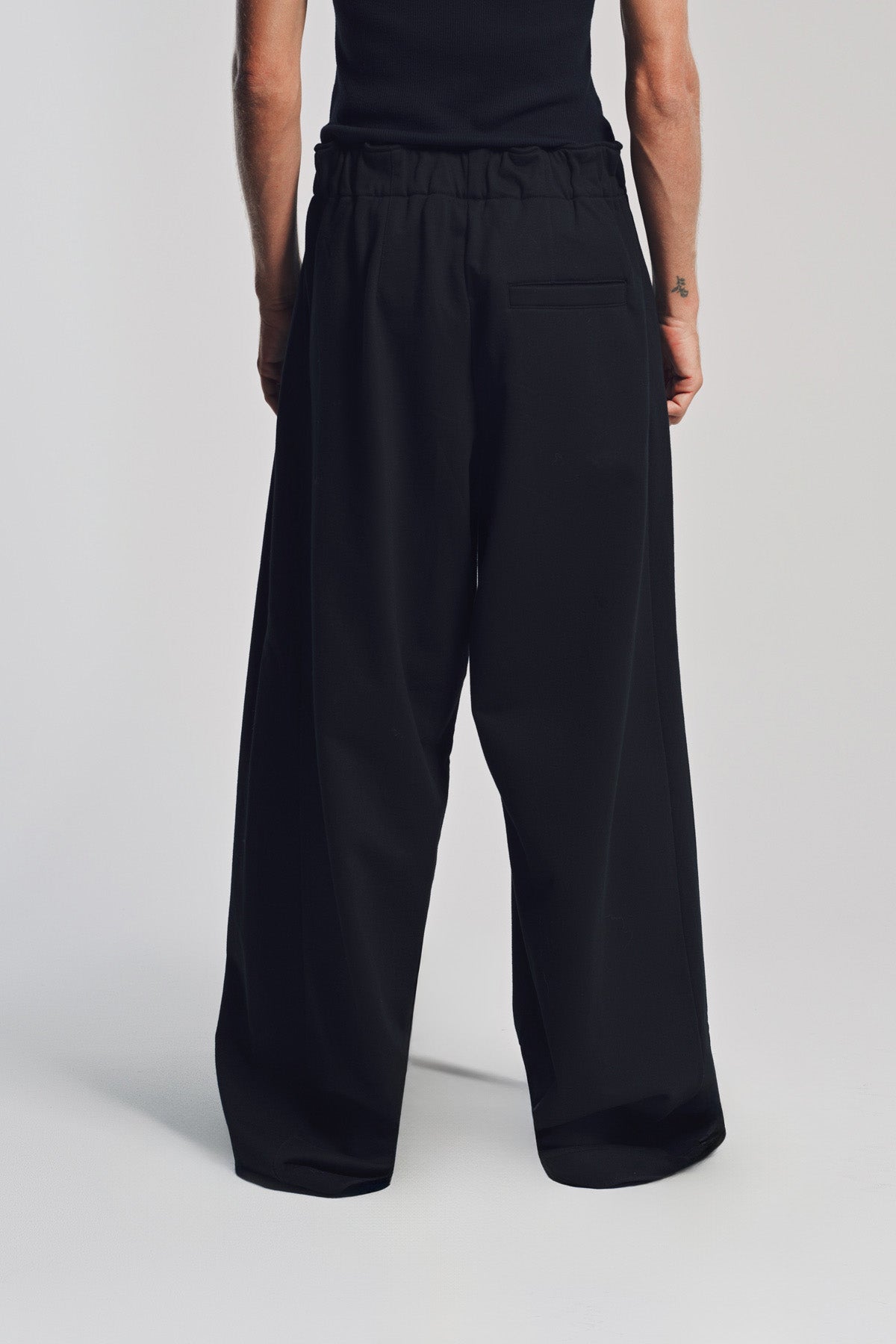 DRIES VAN NOTEN | PLEATED SWEATPANTS