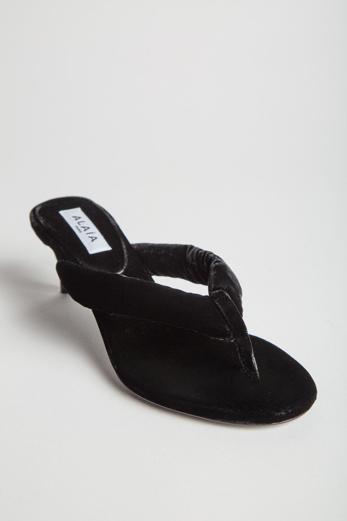 ALAÏA | HEEL THONG MULES IN VELVET