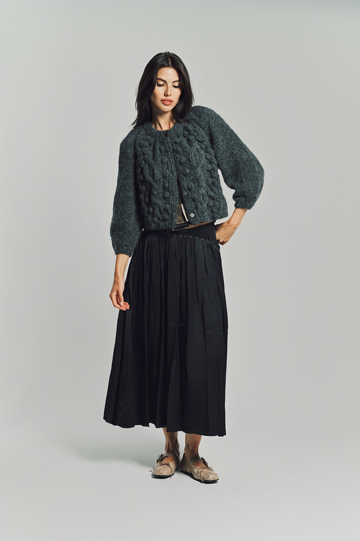 MERUERT TOLEGEN | CROSS PLEAT SLEVE CARDIGAN