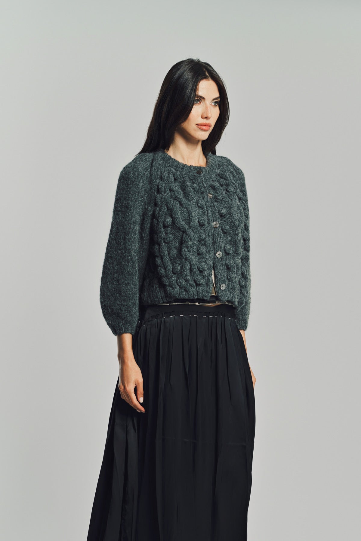 MERUERT TOLEGEN | CROSS PLEAT SLEVE CARDIGAN