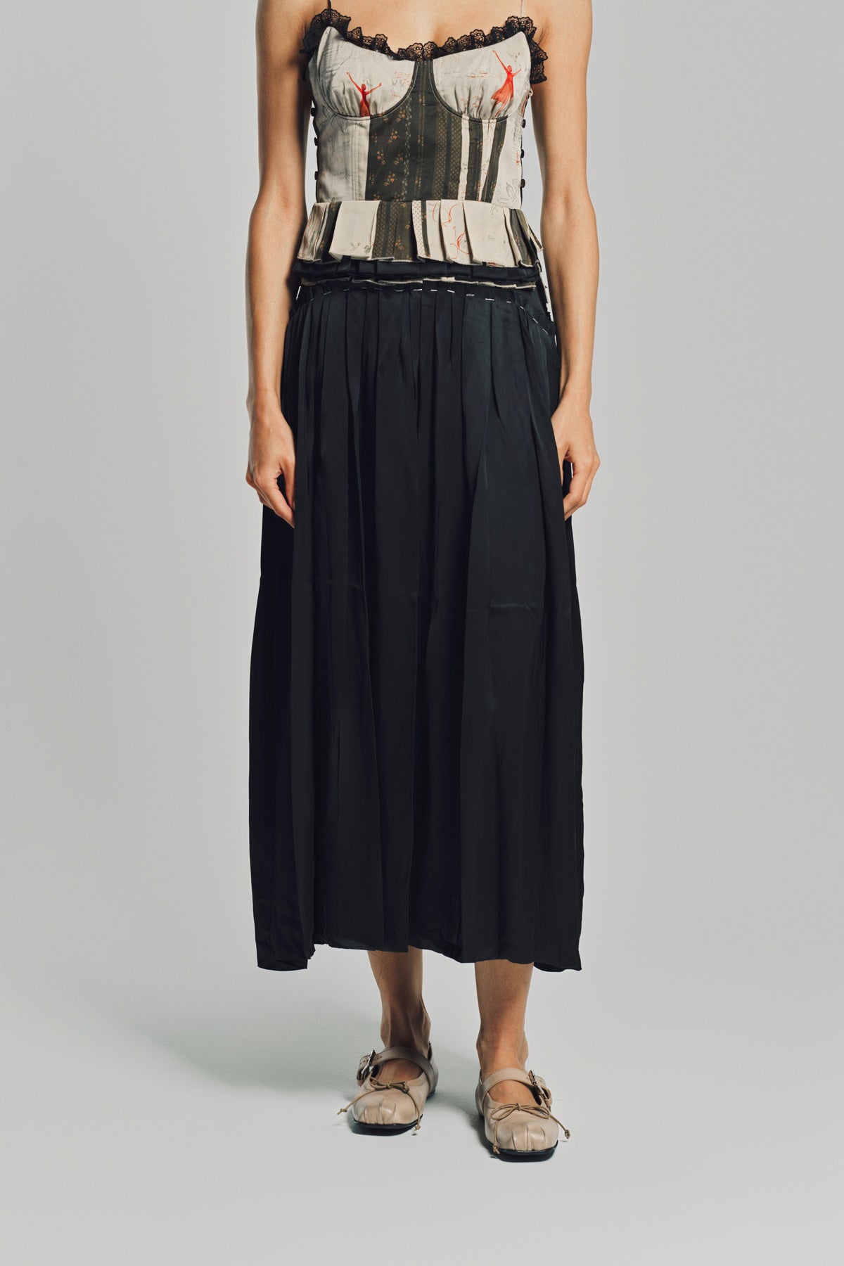 MERUERT TOLEGEN | LIQUID BASTED PLEATED SKIRT