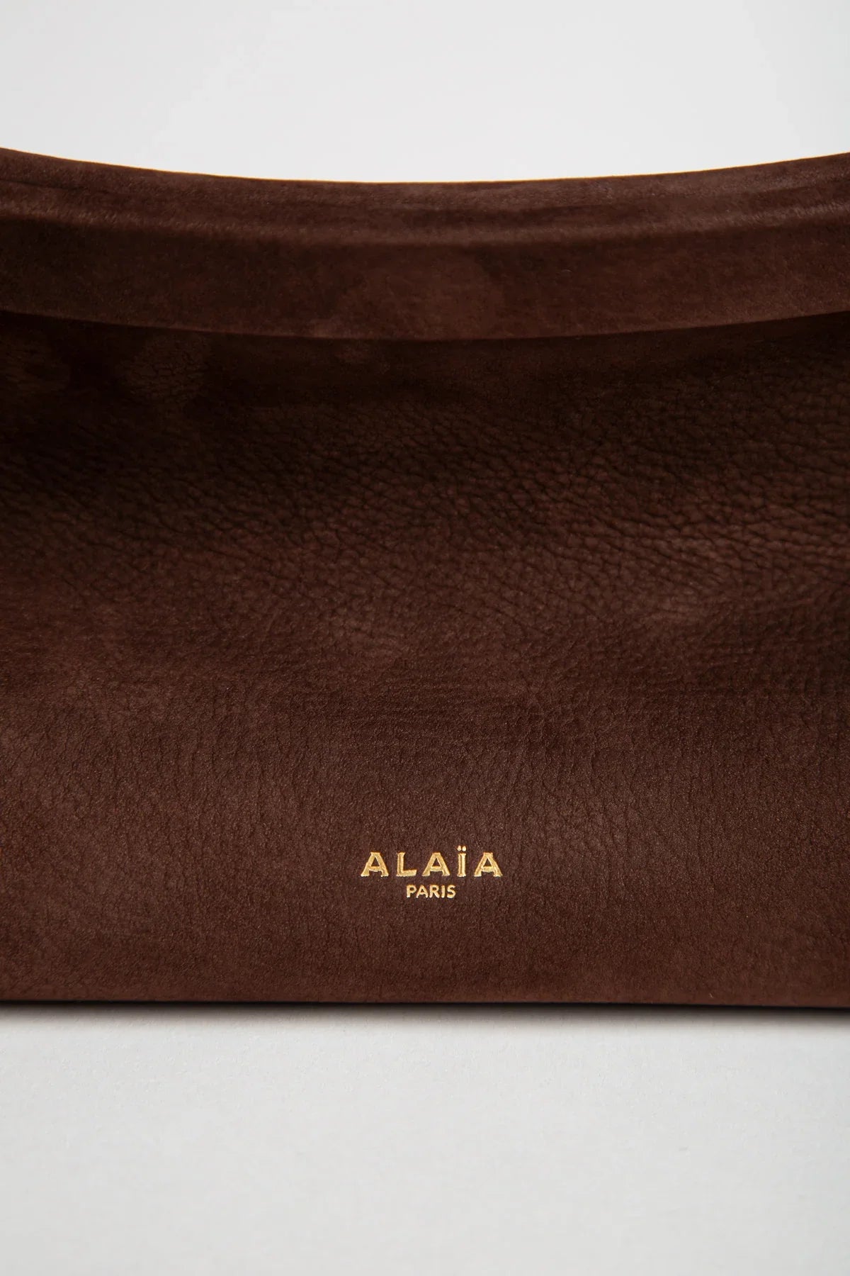 ALAIA | LE CLICK EAST WEST MEDIUM BAG IN NUBUCK