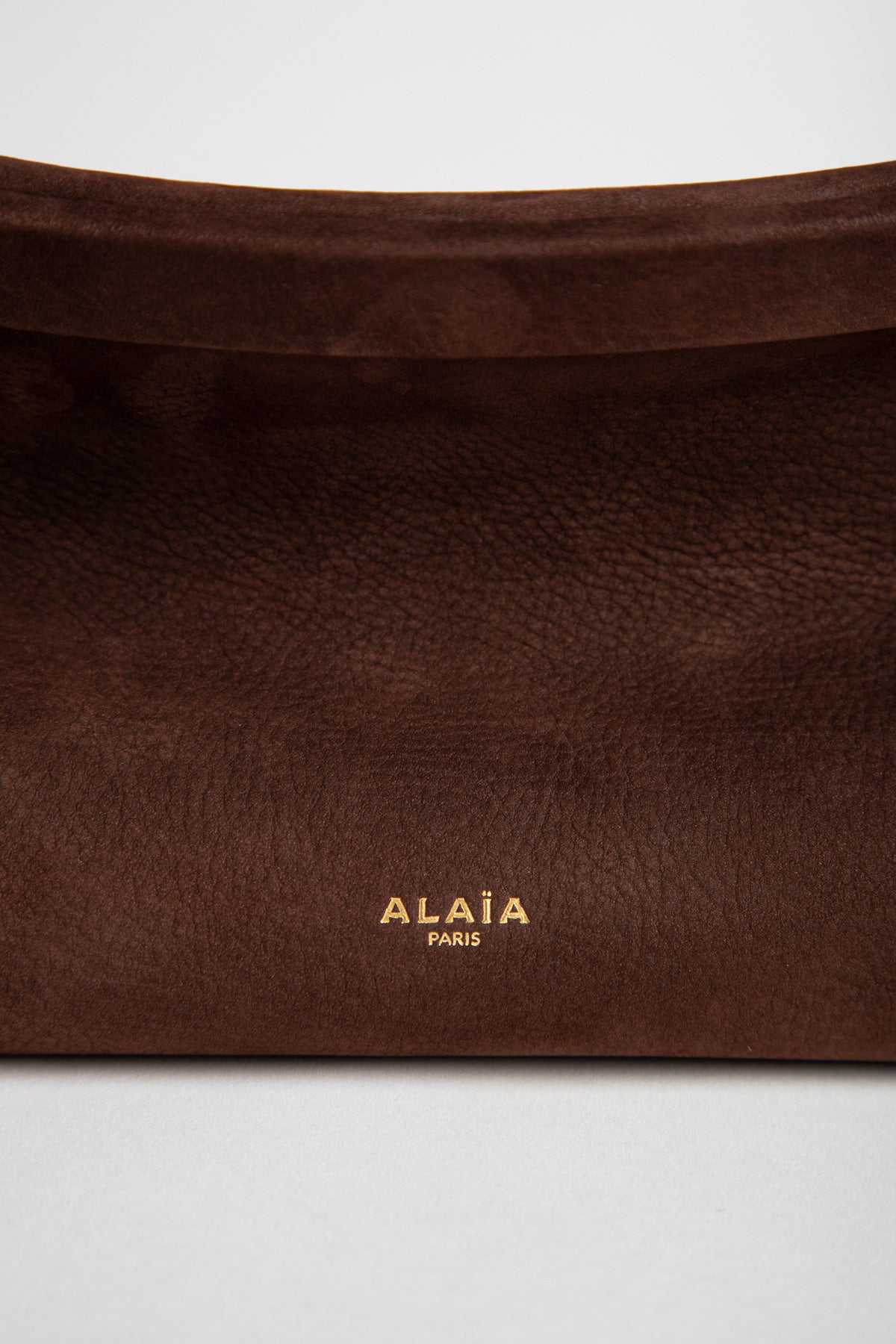 ALAIA | LE CLICK EAST WEST MEDIUM BAG IN NUBUCK