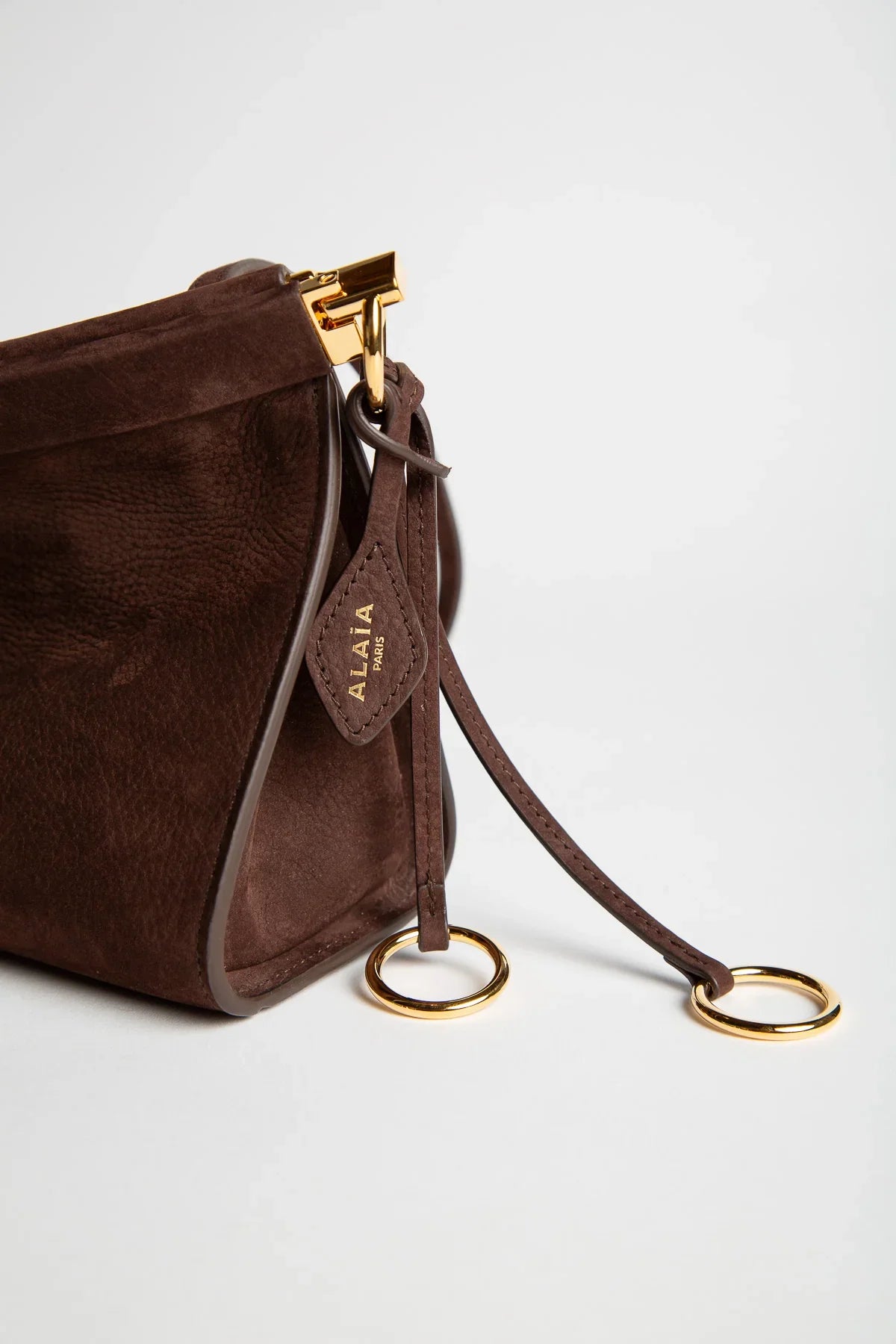 ALAIA | LE CLICK EAST WEST MEDIUM BAG IN NUBUCK
