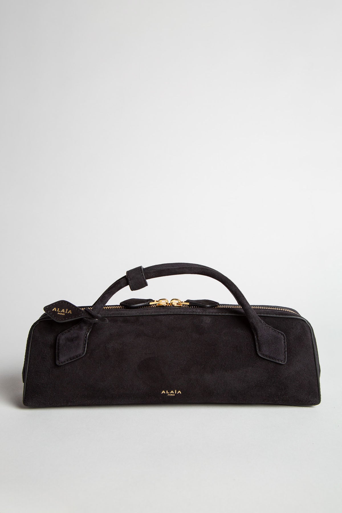 ALAIA | LE TECKEL CLUTCH IN SUEDE GOATSKIN