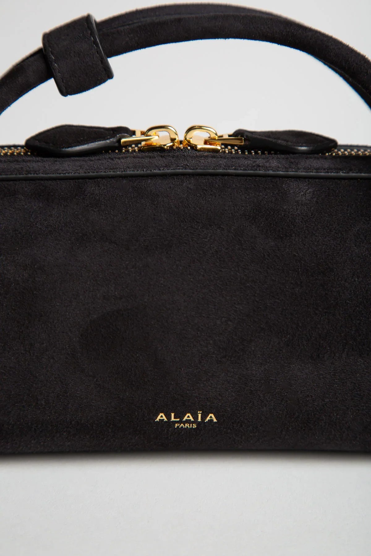 ALAIA | LE TECKEL CLUTCH IN SUEDE GOATSKIN