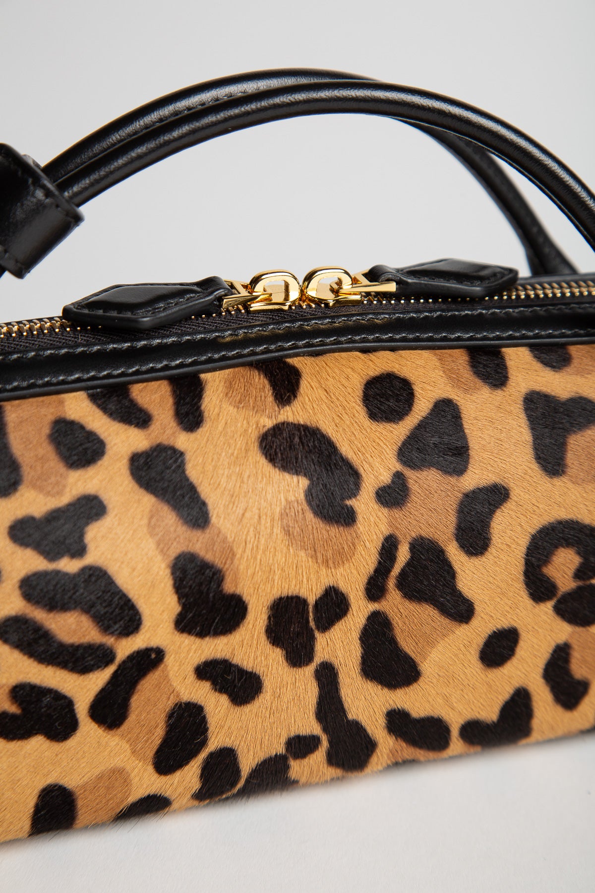 ALAIA | LE TECKEL CLUTCH IN LEOPARD HAIRCALF