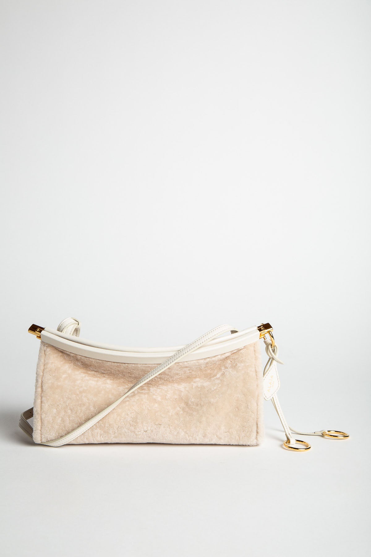 ALAÏA | LE CLICK EAST WEST SMALL BAG IN SHAVED SHEARLING