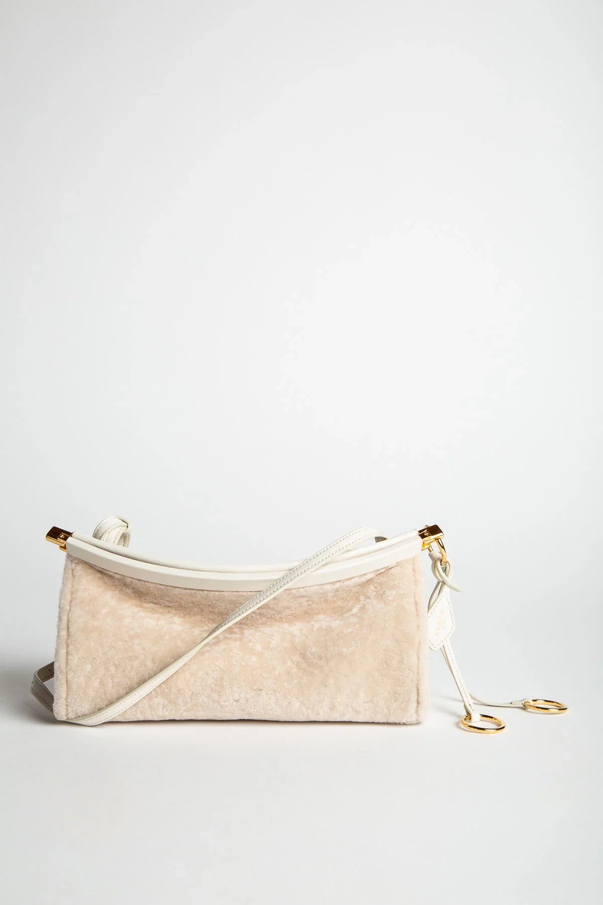 ALAÏA | LE CLICK EAST WEST SMALL BAG IN SHAVED SHEARLING