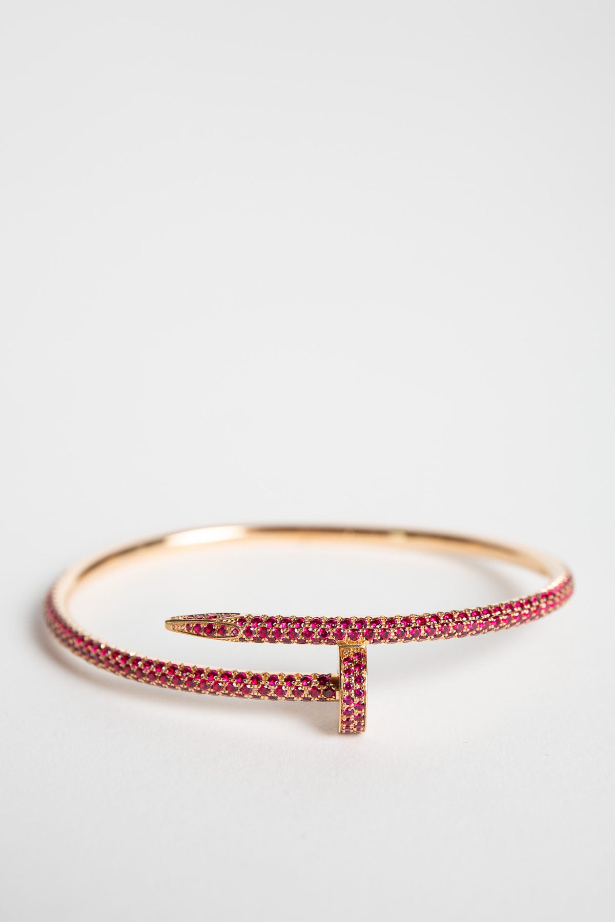 CARTIER | 18K ROSE GOLD, RUBY NAIL BRACELET