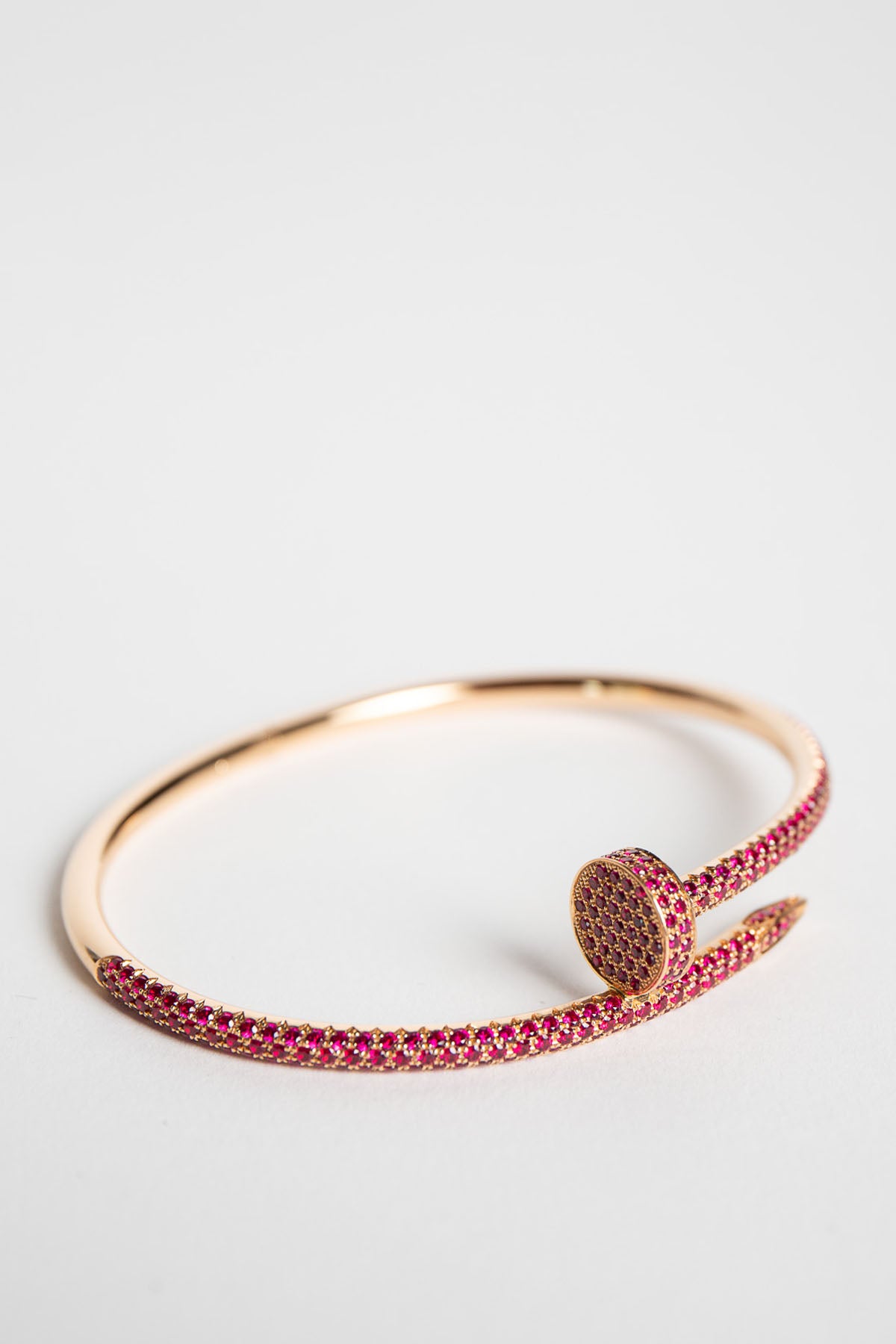 CARTIER | 18K ROSE GOLD, RUBY NAIL BRACELET